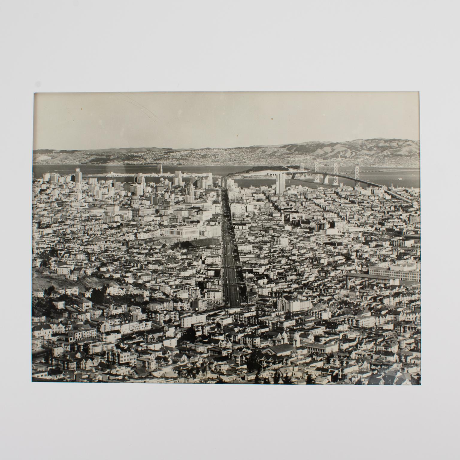 An original silver gelatin black and white photograph was distributed by American Information Services in Paris.
Panoramic view of San Francisco circa 1939.
Features:
Original silver gelatin print photography unframed.
Official Information Services
