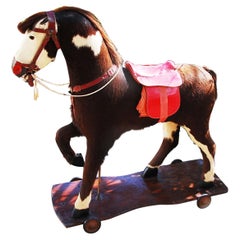 American Large Pony Pull Toy Carved Wood, Horsehair Hide and Saddle Circa 1900