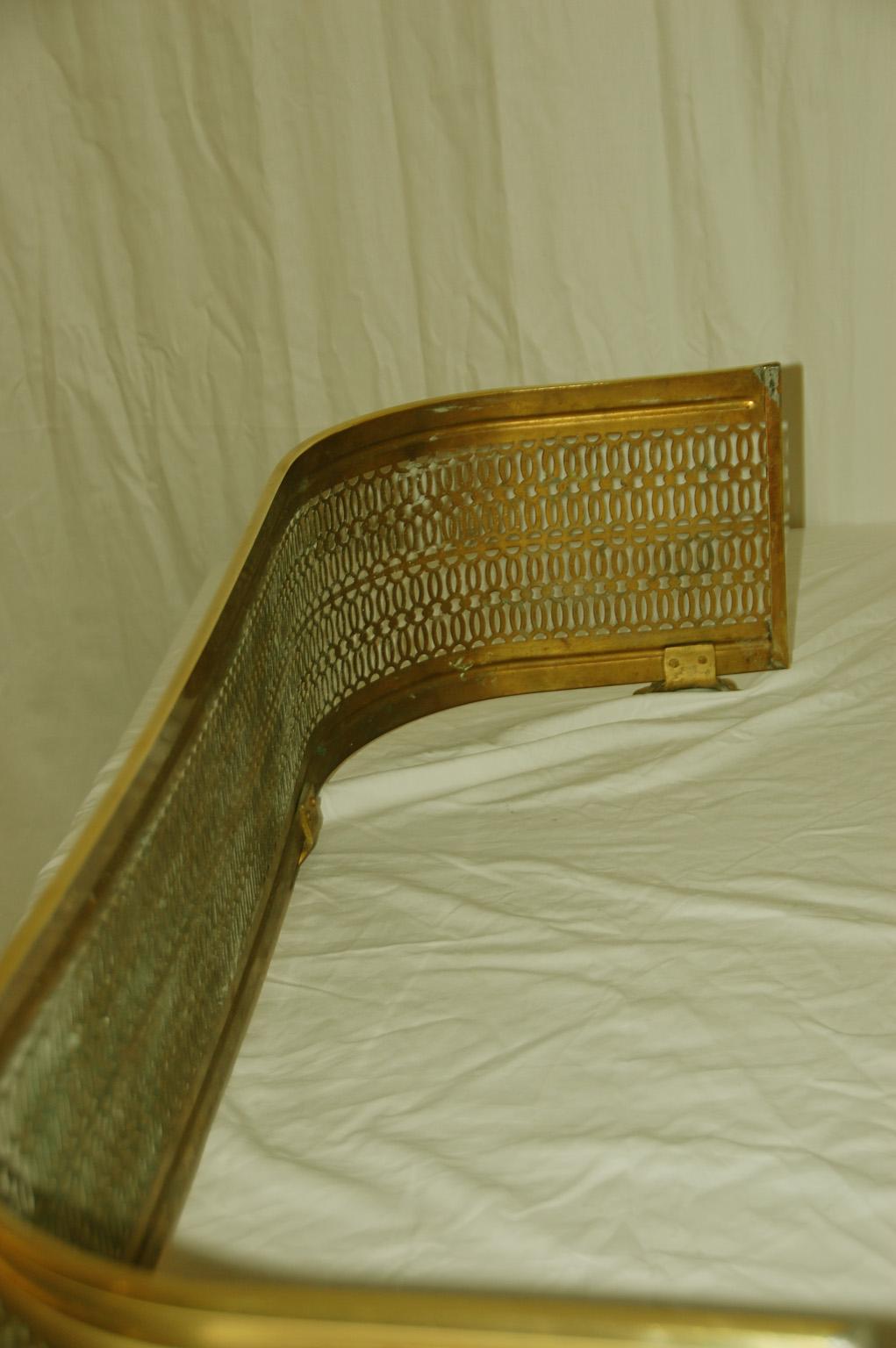 American Late 19th Century Brass Pierced Footed Fender 1