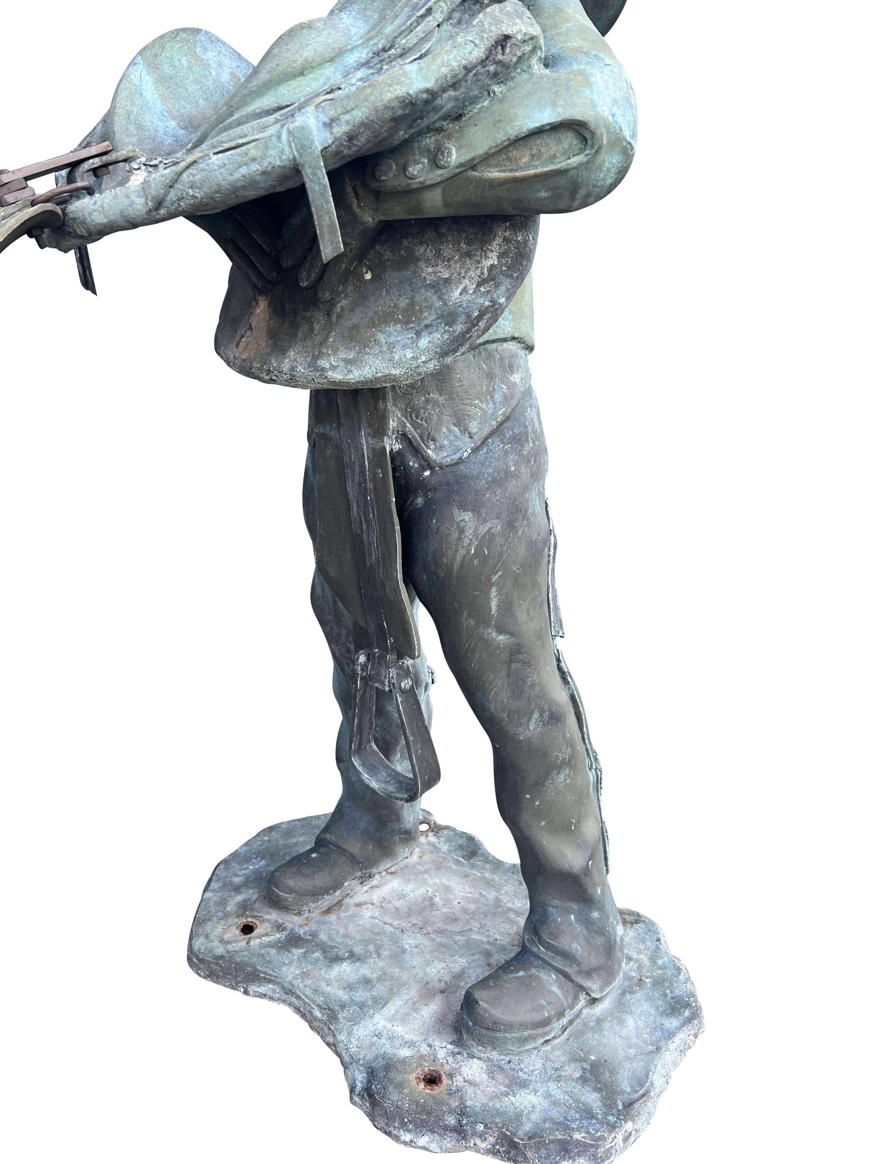 American Life Size Bronze of a Young Boy Holding a Saddle 11