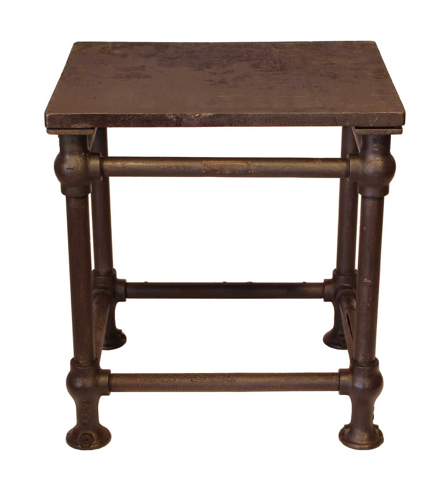 Original American made cast iron and steel industrial stationary printers letterpress table. This 'Turtle Table' was used in the printmaking industry for making up printing forms. Features 11/8