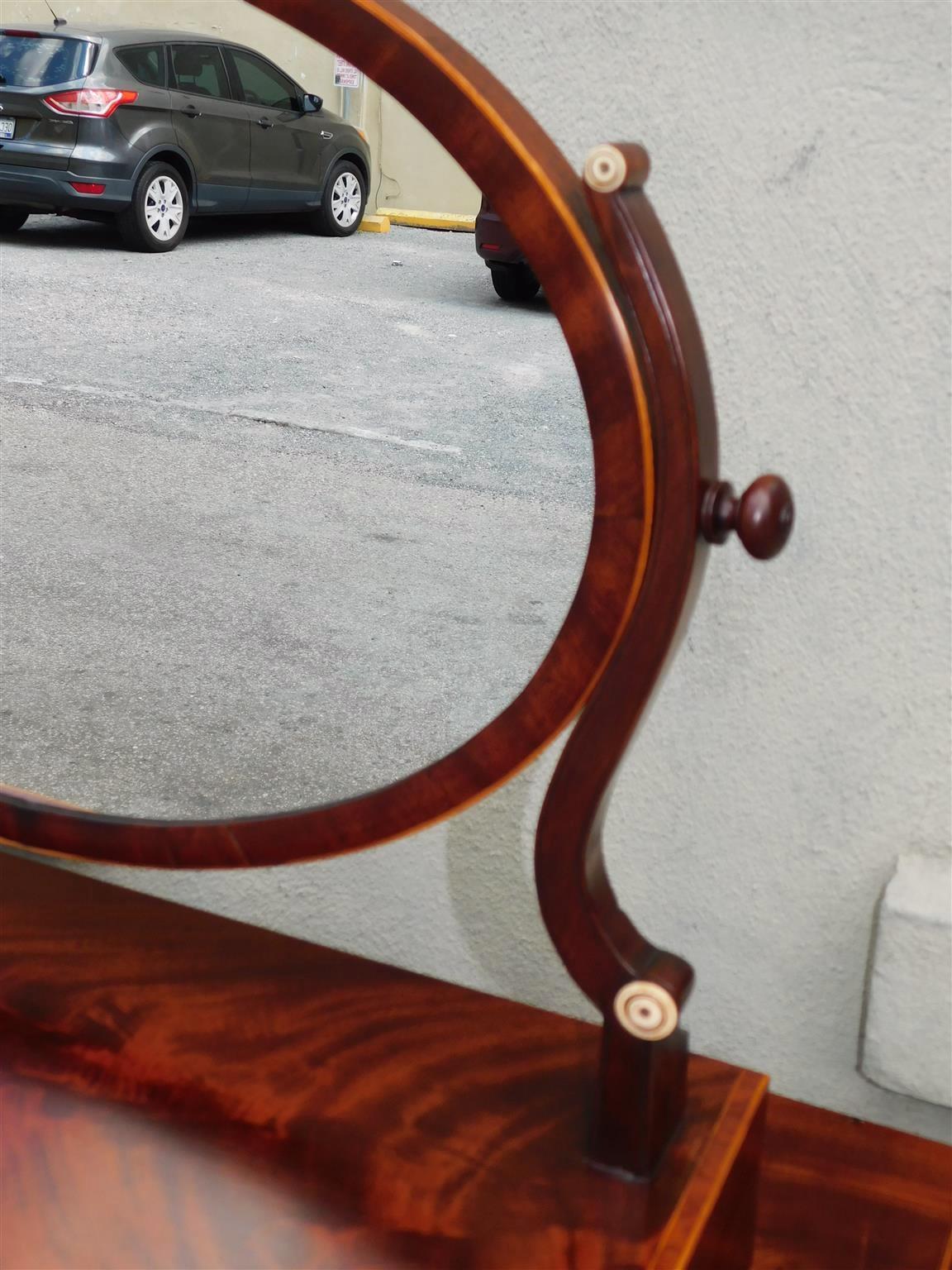 Early 19th Century American Mahogany Bow Front Satinwood Inlaid Oval Dressing Mirror, Boston C 1800 For Sale