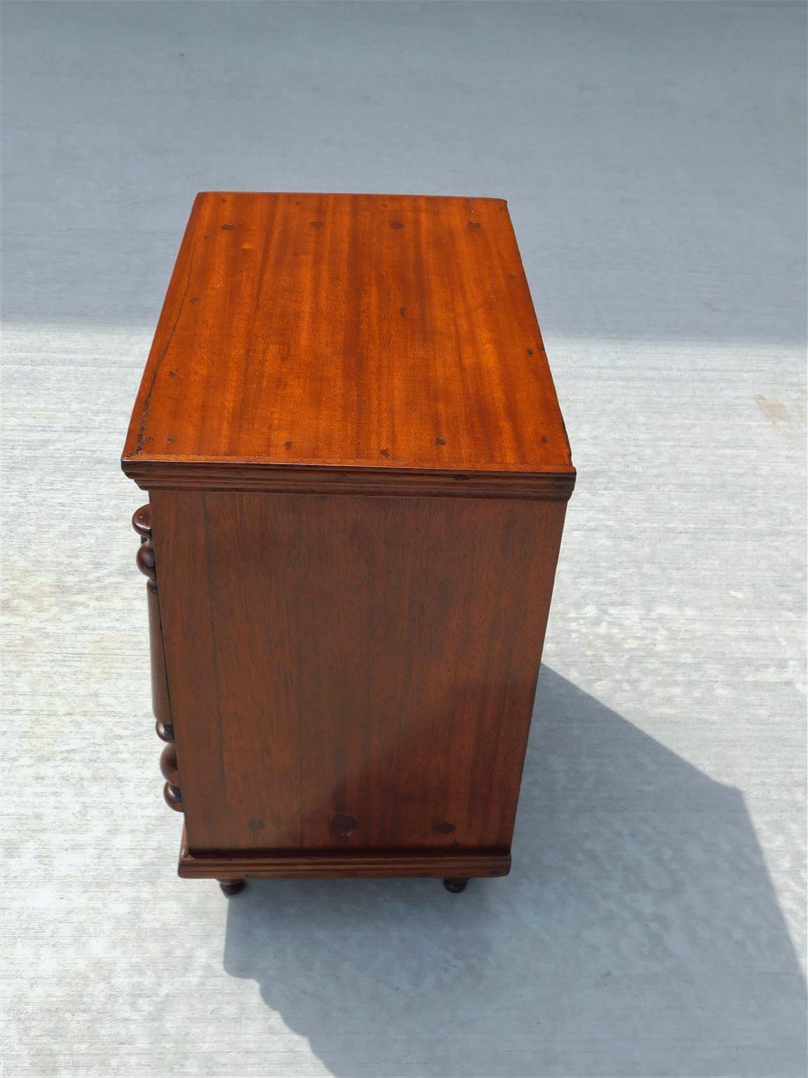 Early 19th Century American Mahogany Five Drawer Miniature with Flanking Columns & Bun Feet, C 1820 For Sale