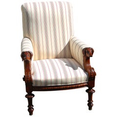 American Mahogany Lounging Chair with Carved Dog Head Armrests