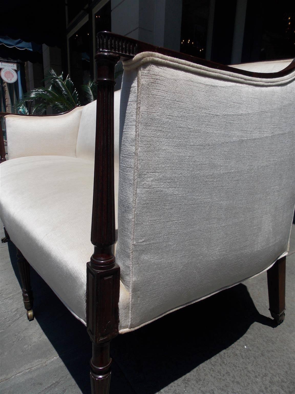 American Mahogany Sheraton Style Upholstered Sofa on Brass Casters. Circa 1880 For Sale 1