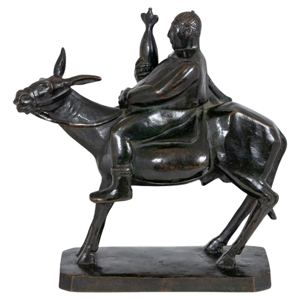 Bronce patinado americano "Hombre montado en burro
