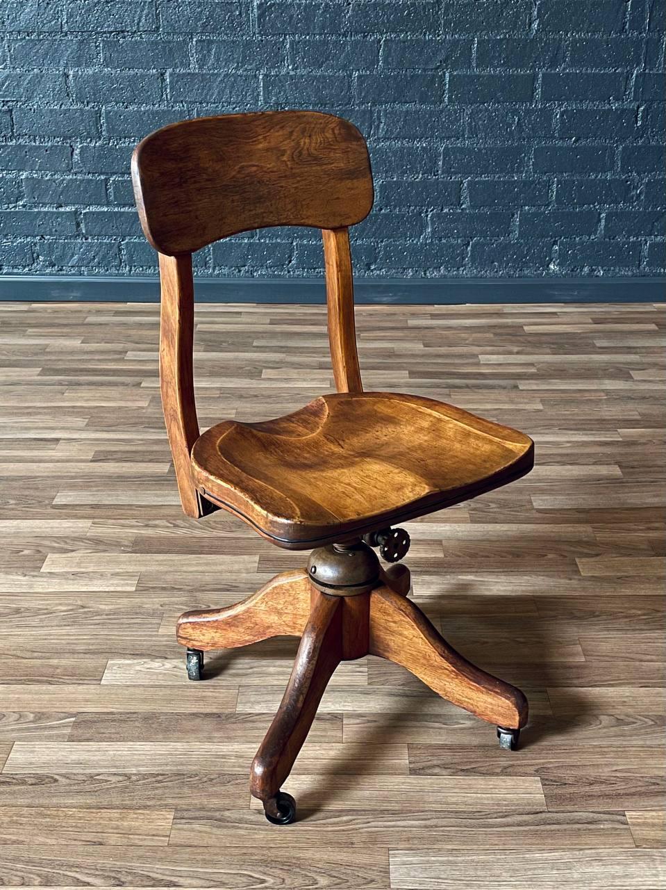 Condition: Original Vintage Condition
Materials: Maple, Metal Casters
Style: American Industrial 
Dimensions: 
33.50” -37