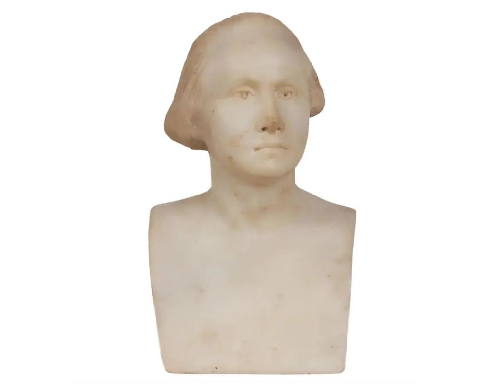 An American Marble Bust of George Washington, After Houdon, C. 1890.

Made from hand-carved white marble, a nice quality sculpture of George Washington.

Signed Houdon to the back.

Good condition, no damages noted. Minor pins to the