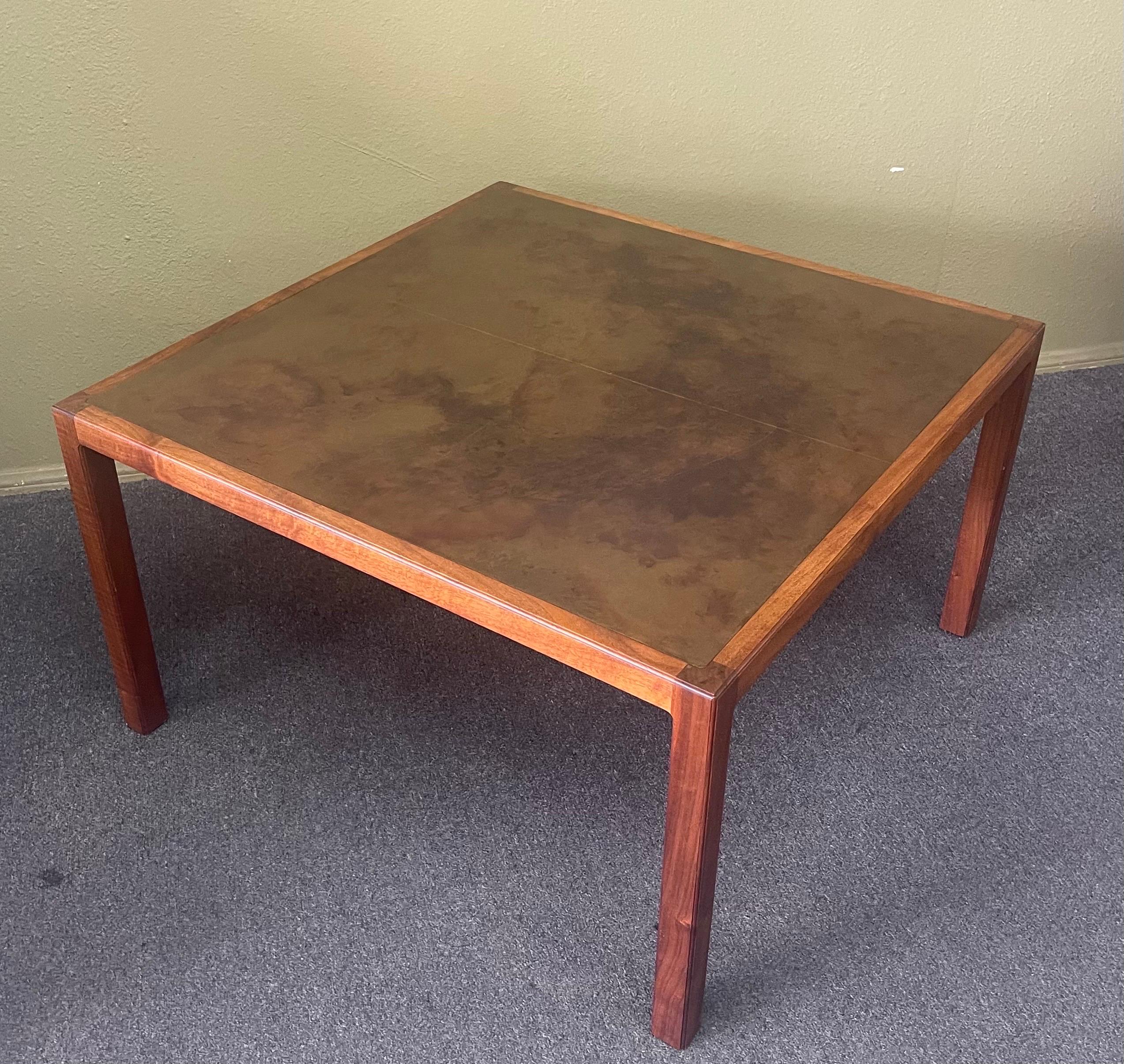 A gorgeous American MCM walnut coffee table with acid etched copper top by Seattle furniture designer Harry Lunstead, circa 1968. Lunstead is renowned for his work with copper and using acid to stain and etch each piece giving it a unique and