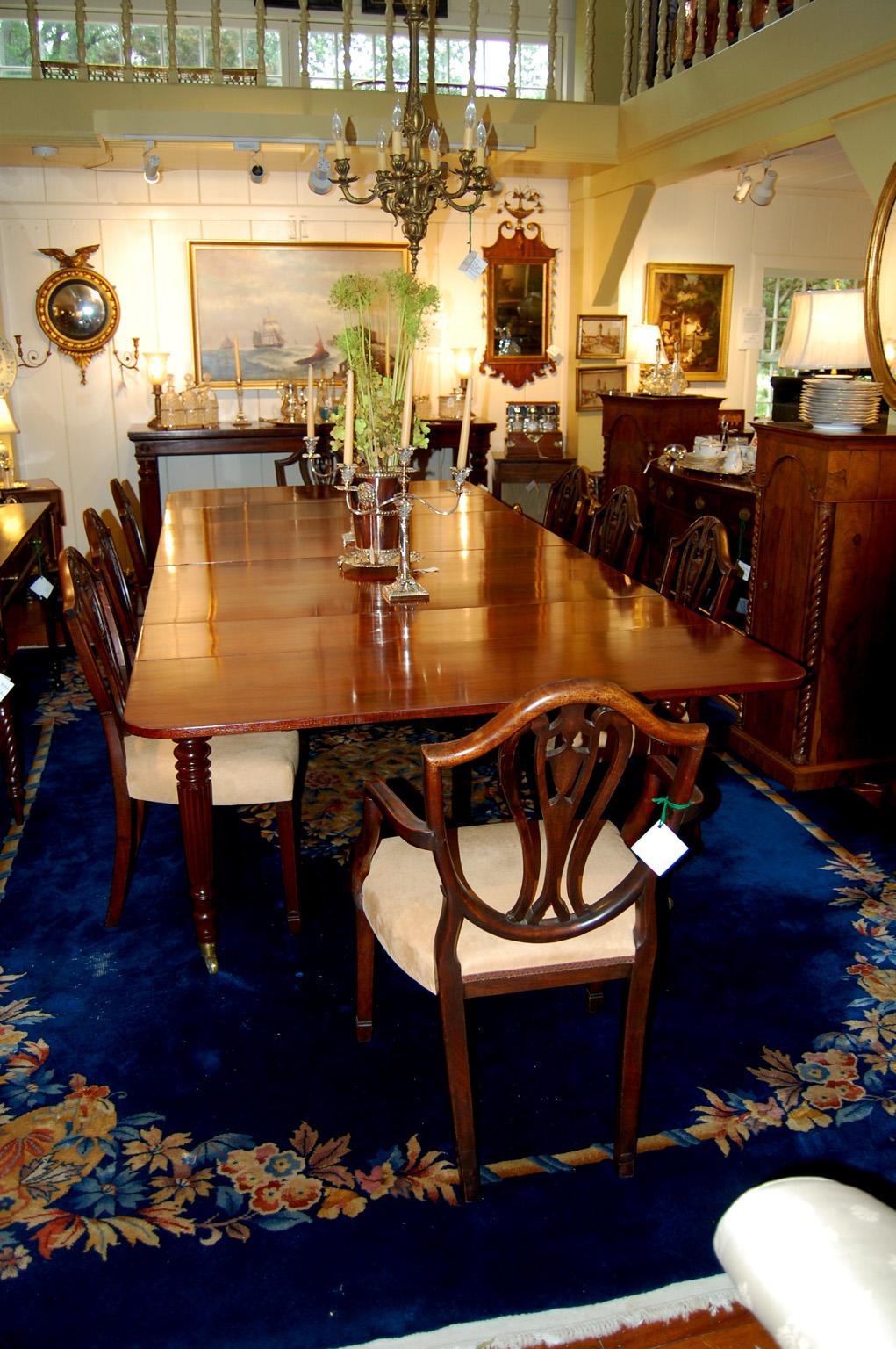   American mahogany  Cornelius Briggs banquet table with original label.  This large table had a patent for its mechanism that allowed the table to extend from 62 1/2