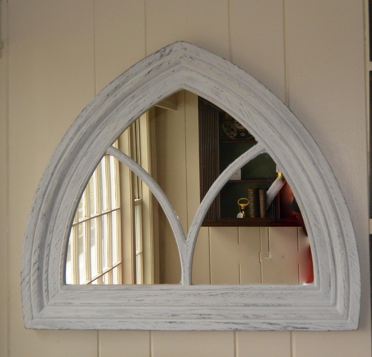 American Gothic Revival peaked window frame with molded muntins and frame. The glass was replaced with mirror, the frame was stripped and then white washed.  This came from a New England home of the mid 19th century.