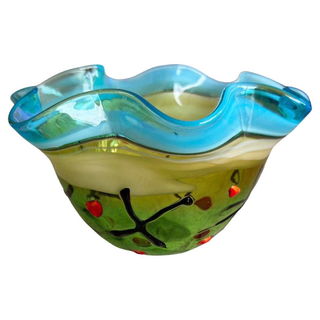 An American multi colored mid century art glass bowl. Original sticker of the bottom. Circa 1970s.