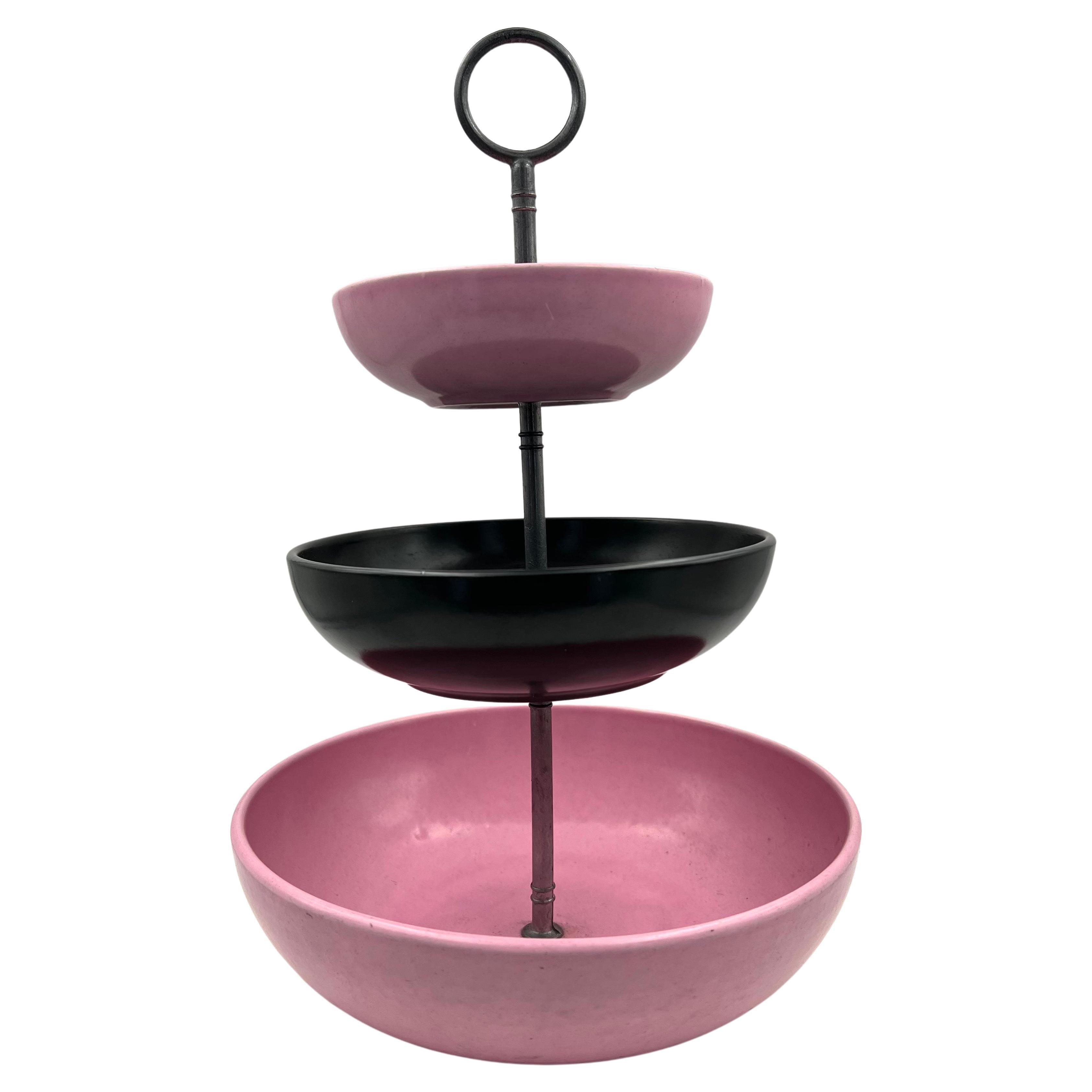 Beautiful 3-tier ceramic bowls in pink and black combo with a metal handle, classic atomic age piece in excellent condition.