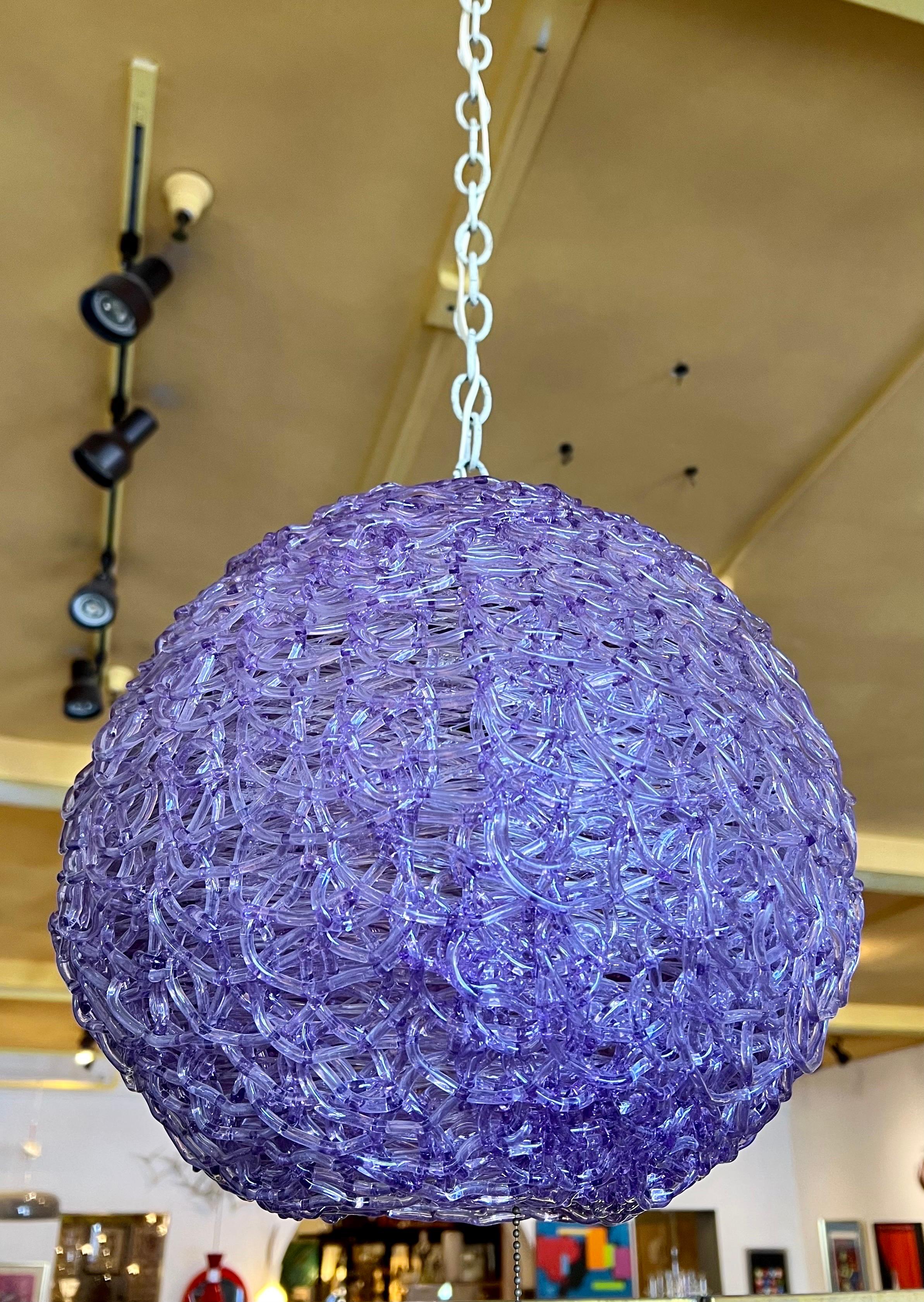 A rare color and great condition on this beautiful groove purple pendant spaghetti lamp, circa 1950s with a white chain 10-foot cord in perfect condition.