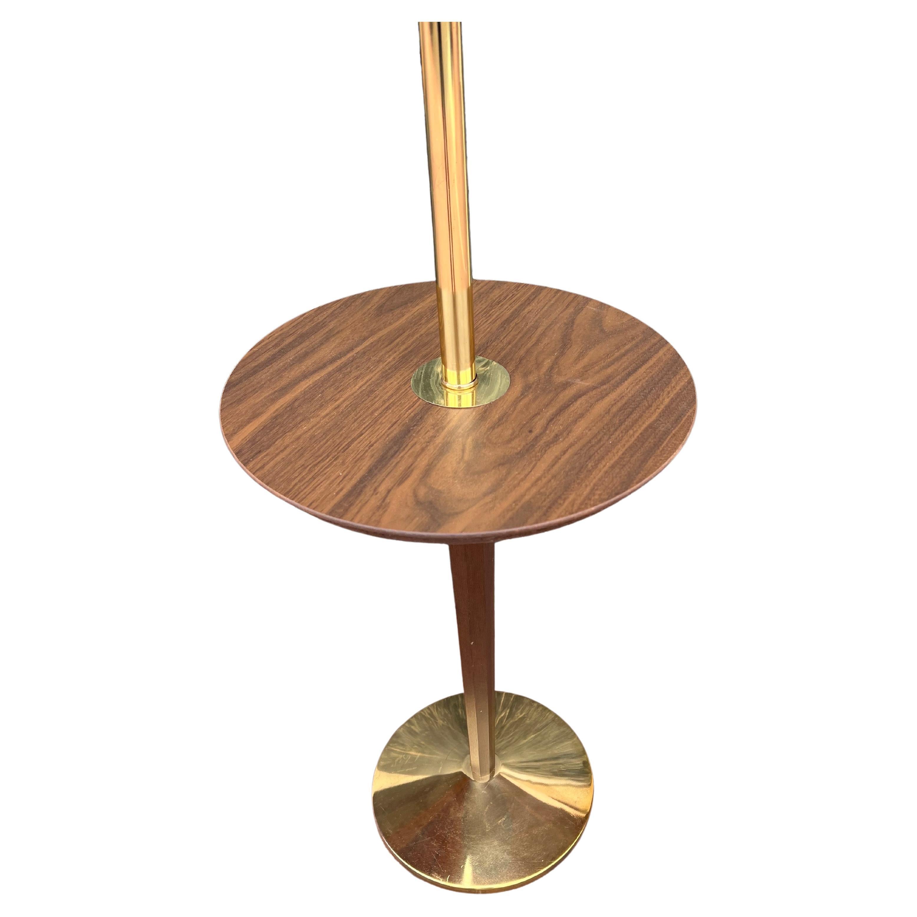 Simple Classic Mid-Century Modern atomic age floor table lamp, circa 1950s in excellent condition probably never used the brass its beautiful and has a nice walnut laminate top with a nice solid walnut base, made by Wolfe creations of California,