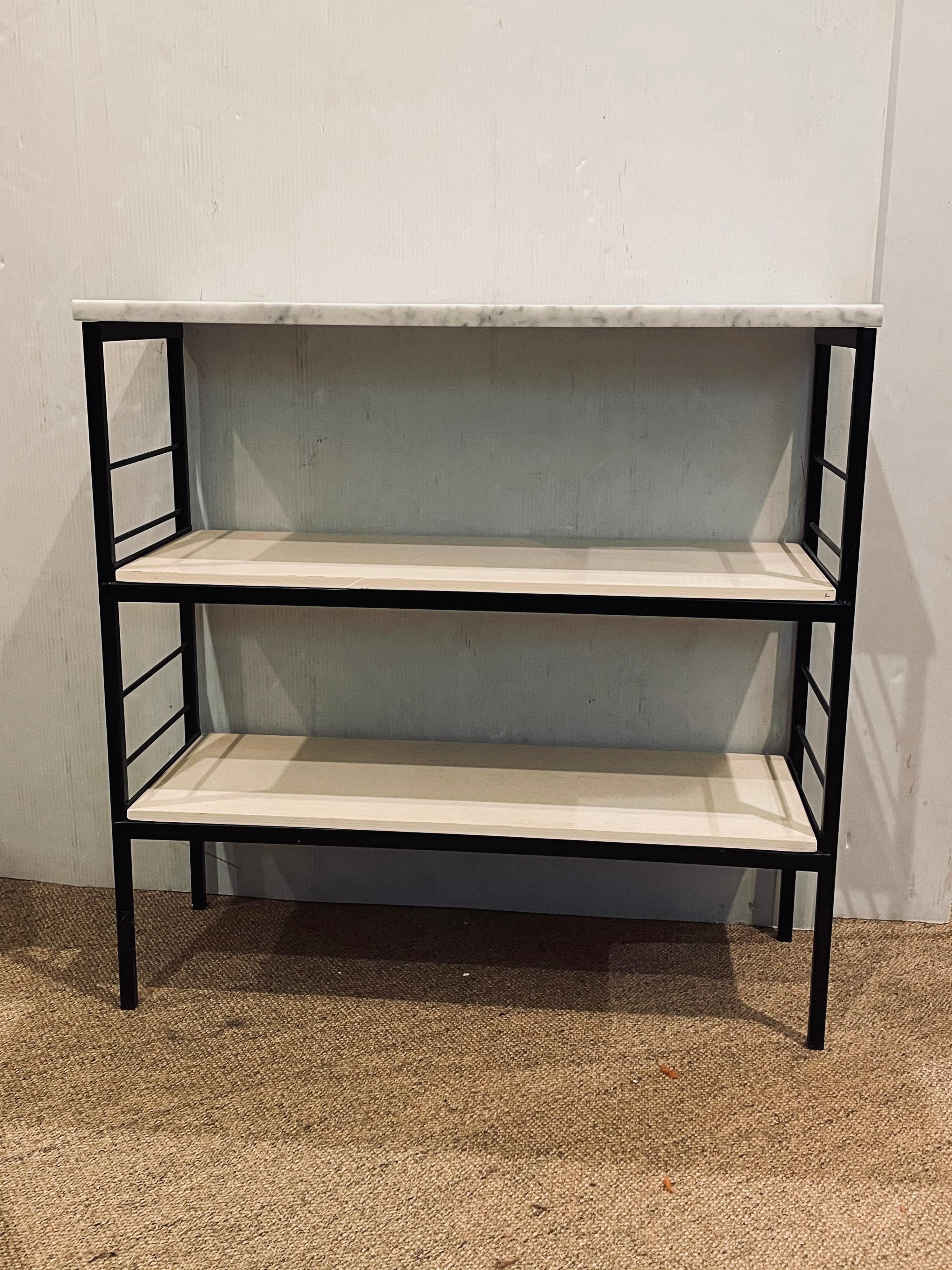 Simple atomic age black enameled metal frame, with wood painted shelves and solid marble top, bookcase made by Vista of California, circa the 1950s, we have resprayed the metal frame replace the top with solid Italian Carrera Marble, and polished