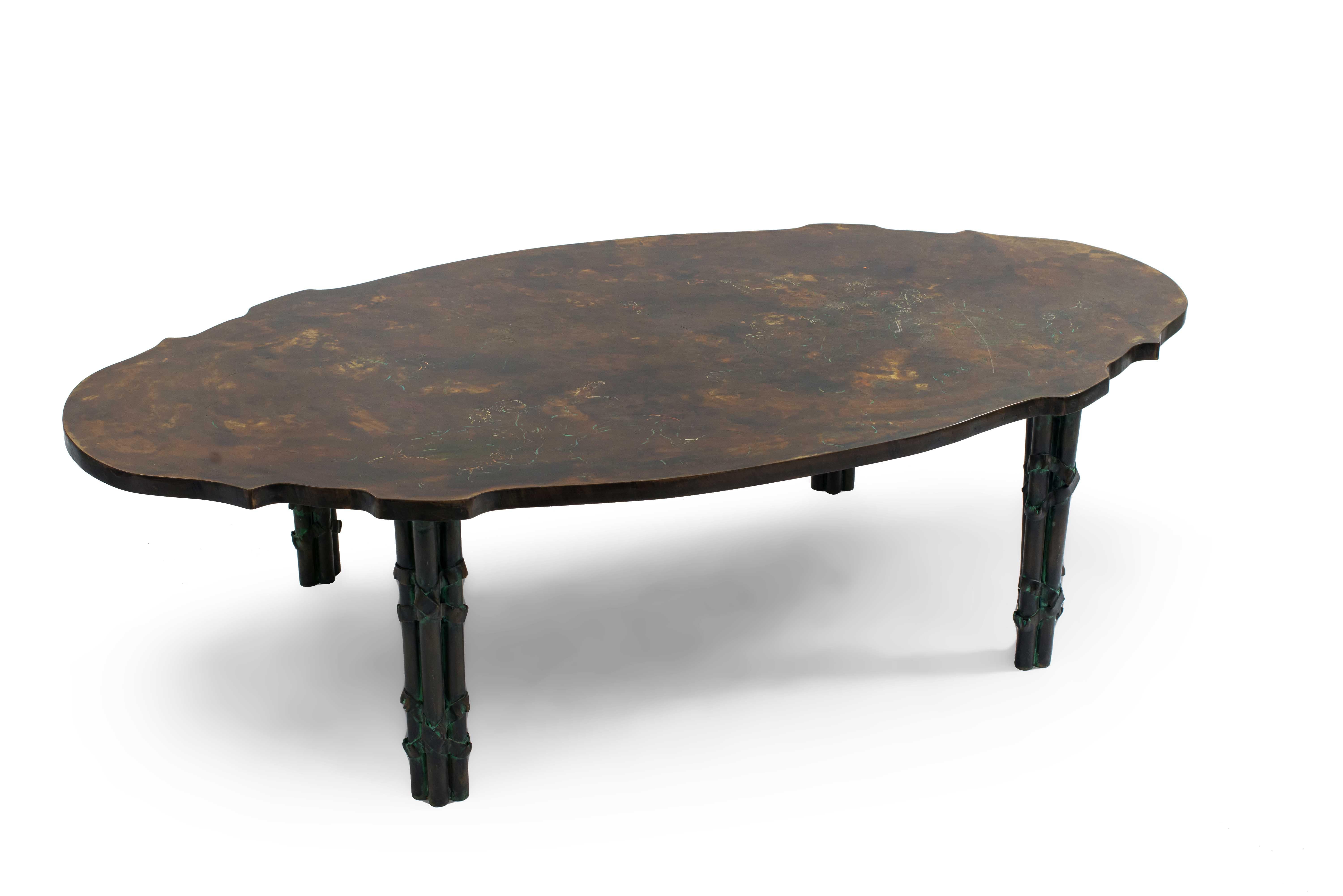 American midcentury patinaed bronze oval shaped coffee table with etched floral design supported on four cluster bamboo legs (by Philip and Kelvin LaVerne).


The father and son team of Philip and Kelvin LaVerne created custom, limited edition