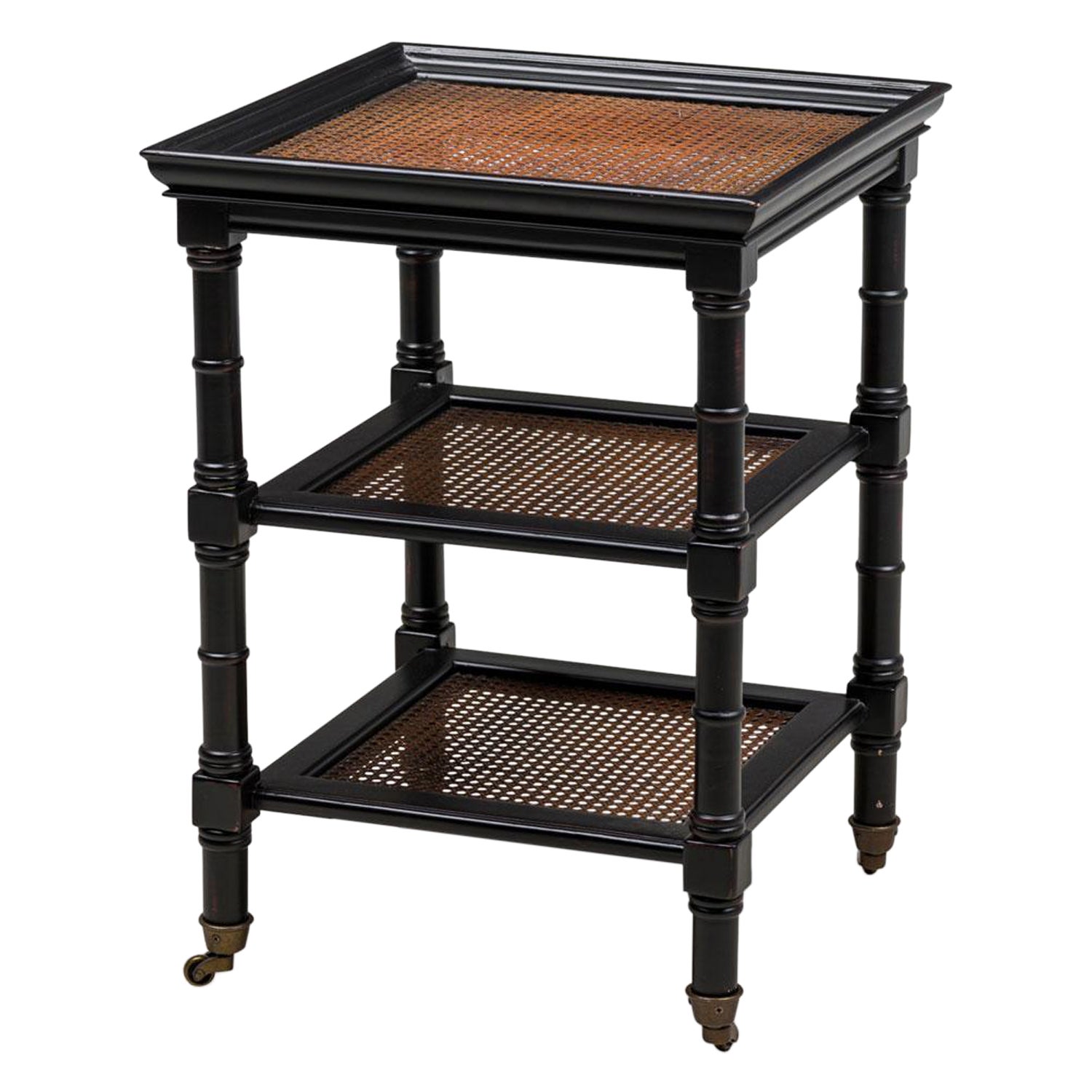 American Mid-Century Ebonized and Cane Three Tier Table en vente