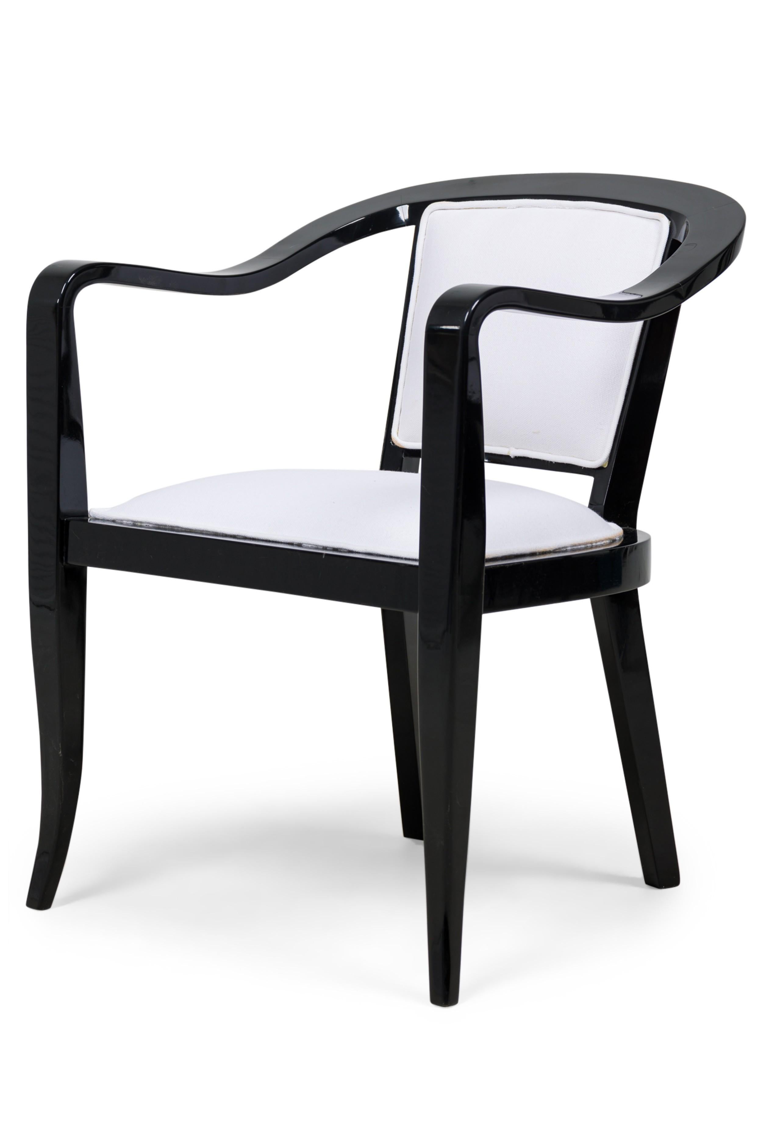 American Mid-Century ebonized wood continuous roundback armchair with white upholstery (EDWARD WORMLEY for DUNBAR)