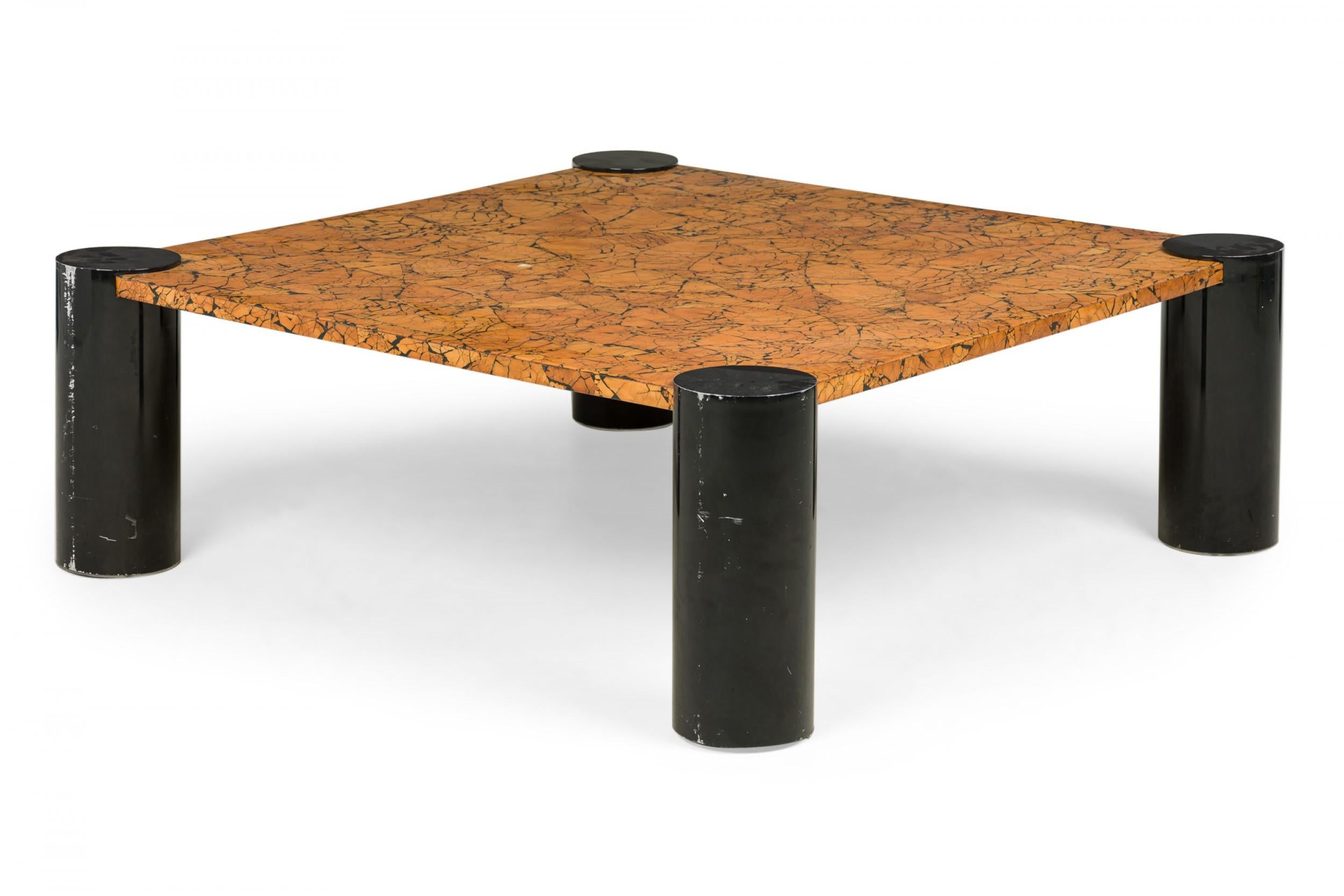American Mid-Century (1970s) enameled low / coffee table with a square black and brown crackle patterned tabletop supported by four cylindrical ebonized legs.
 

 Wear to finish from age & use, chip on top.
