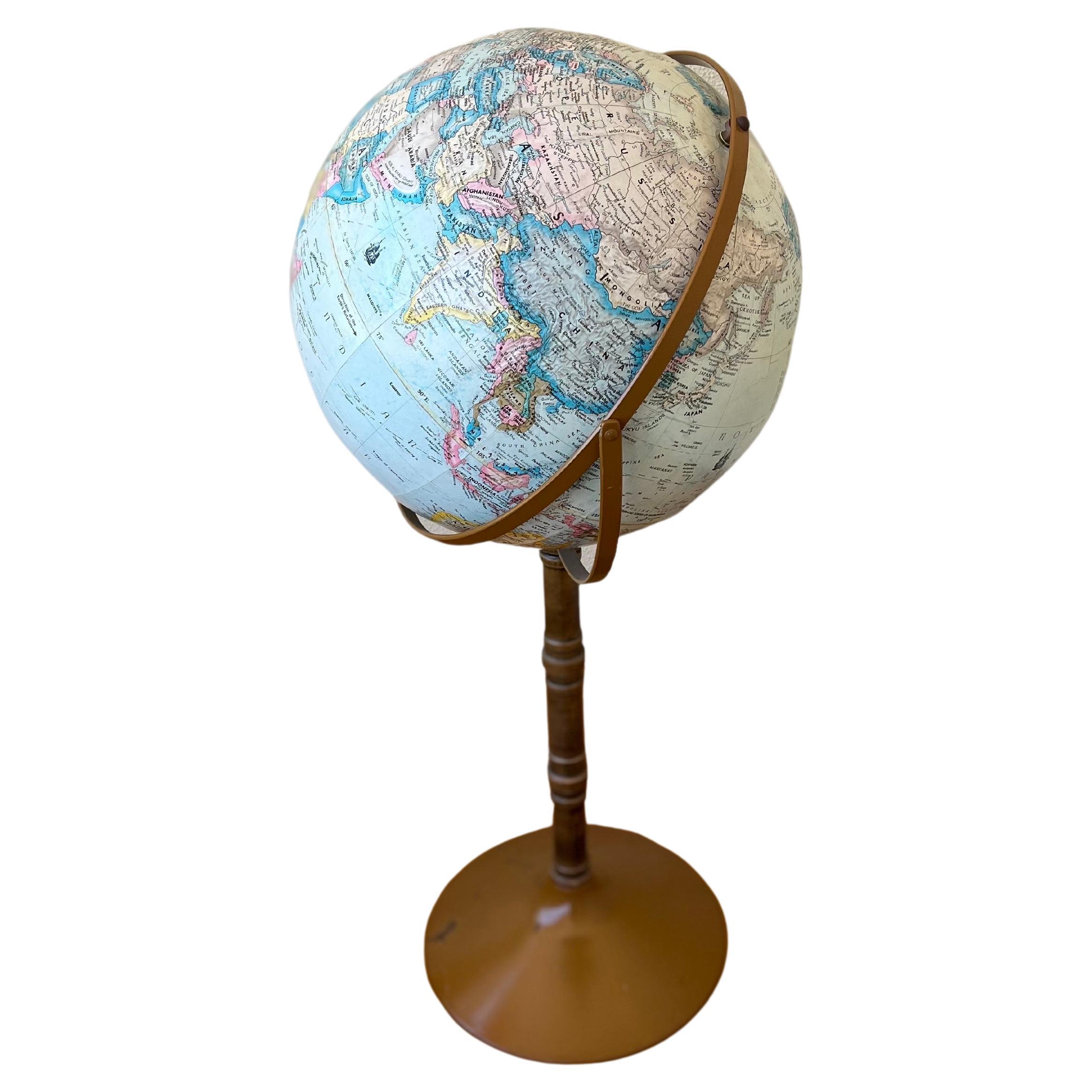 Nice floor stand model globe by Replogle Globes circa 1970's. original vintage condition with some light wear and a little rust on the base that can easily be repainted but it's sold AS/IS condition.