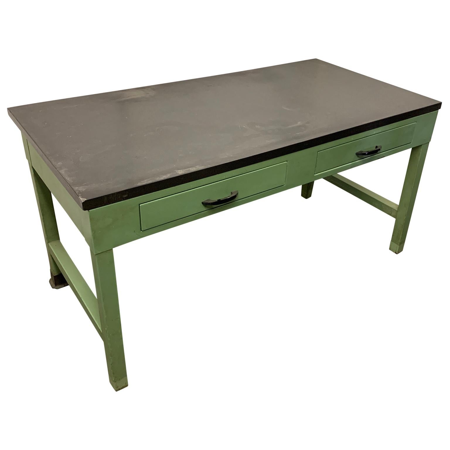 American mid-century green painted Industrial black slate top two-drawer working table.