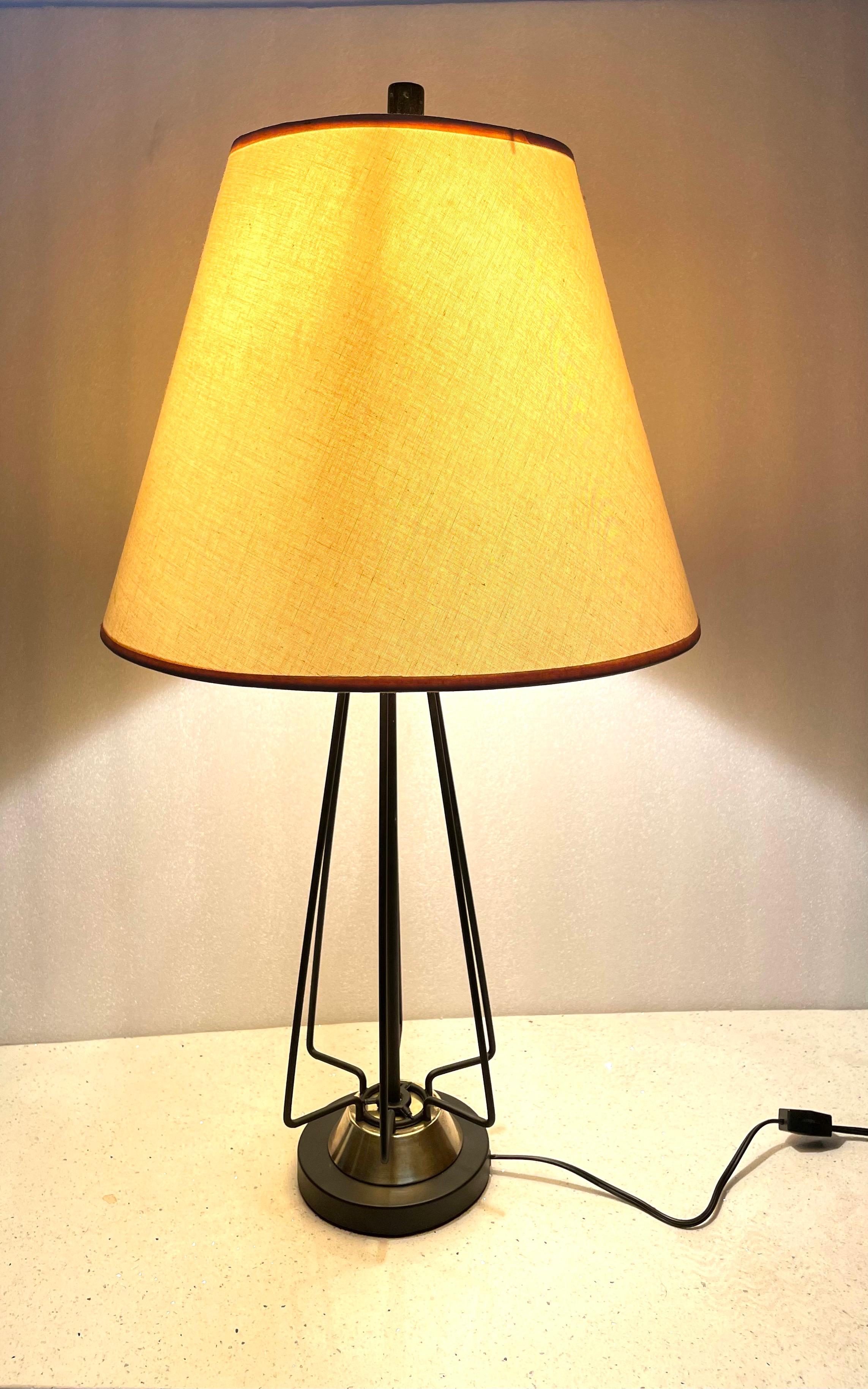 A classic mid-century we resprayed the base and left the original lampshade in original condition. modern atomic age table lamp, circa 1950's freshly rewired and replace the socket new cord, and switch.
