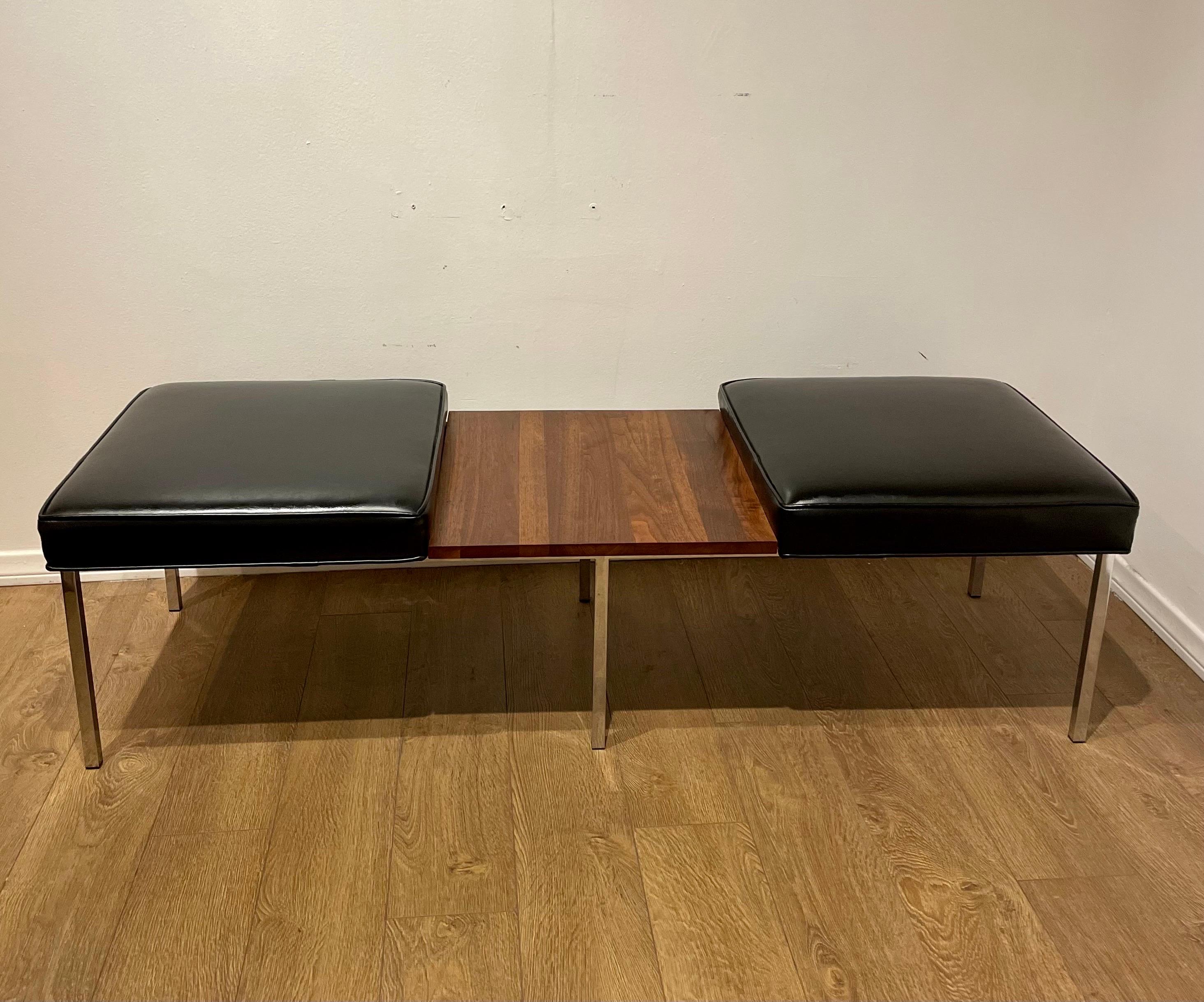 American Mid-Century Modern bench in great condition, solid walnut center with original back Naugahyde, circa 1970's sitting on square piping chrome base great clean condition we polished the base and refinished the walnut.