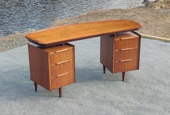 American Mid-Century Modern Carved Walnut Curved Kneehole Double Pedestal Desk