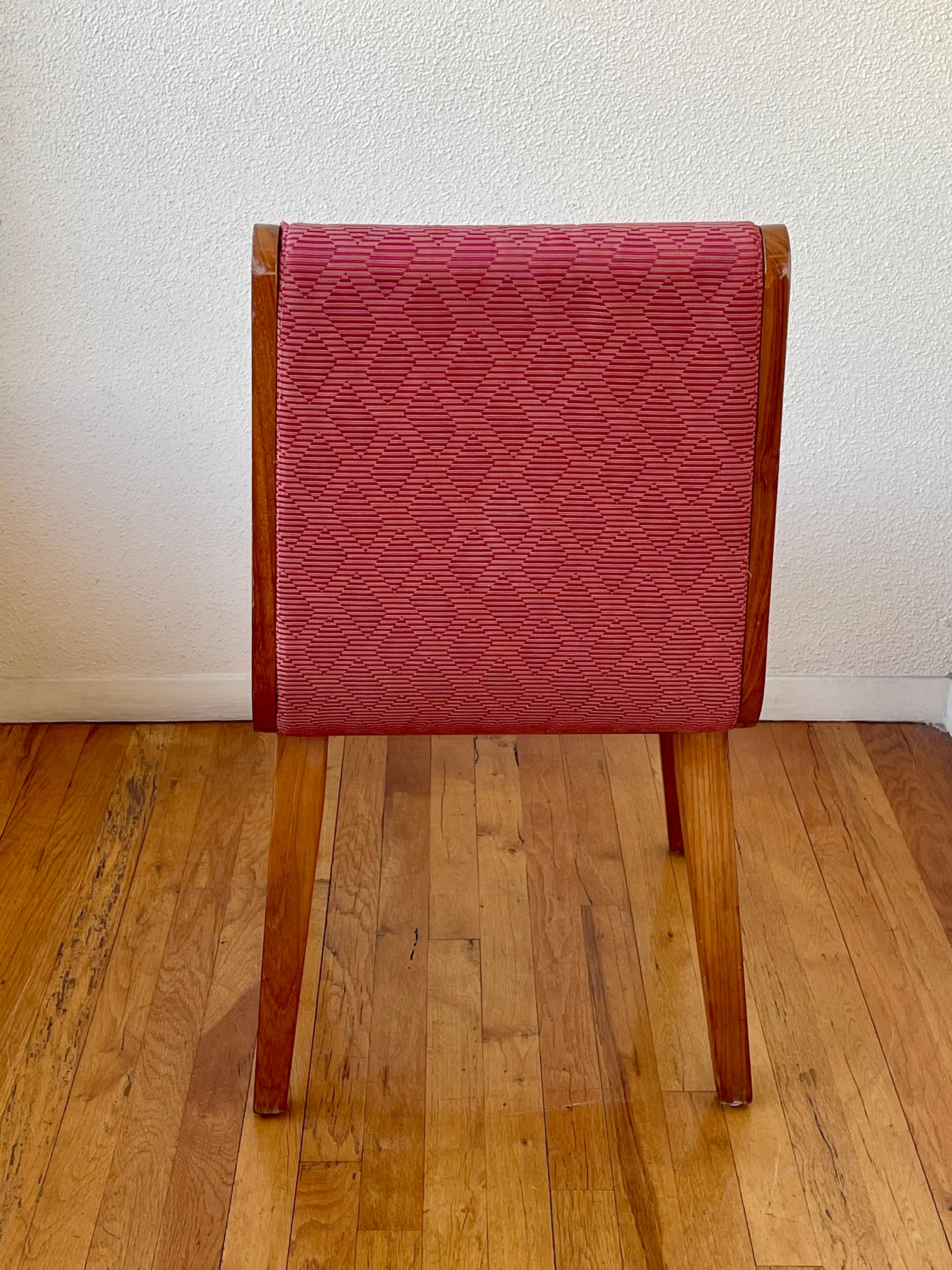 Well constructed single chair upholstered in its original material and condition, solid and sturdy solid walnut frame, circa 1950s.