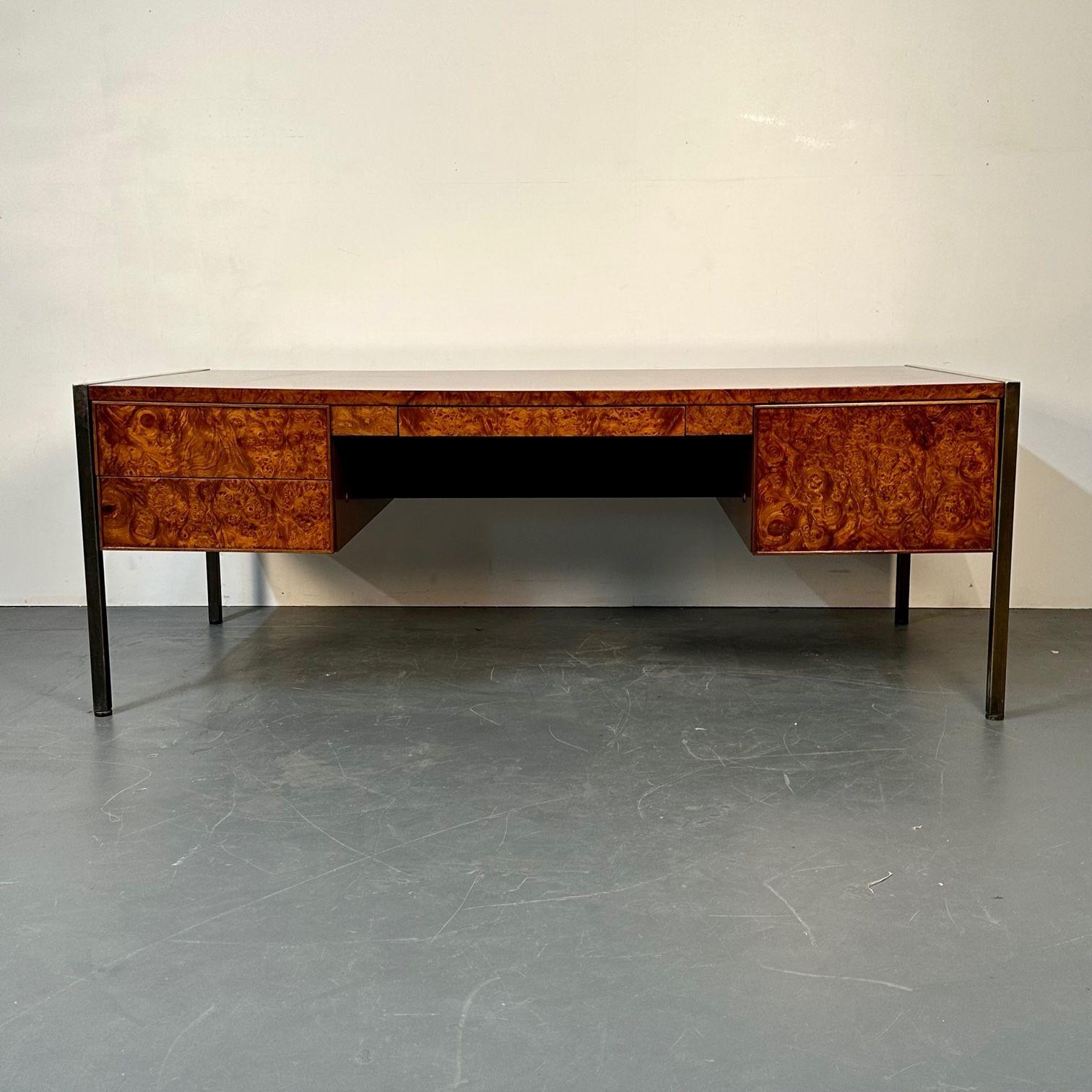 American Mid-Century Modern Refinished Burl Olivewood and chrome desk, Baughman Style
 
A large and palatial writing desk having enormous form for that important executive. The very finest burl olivewood having a tortoise shell finish with metal
