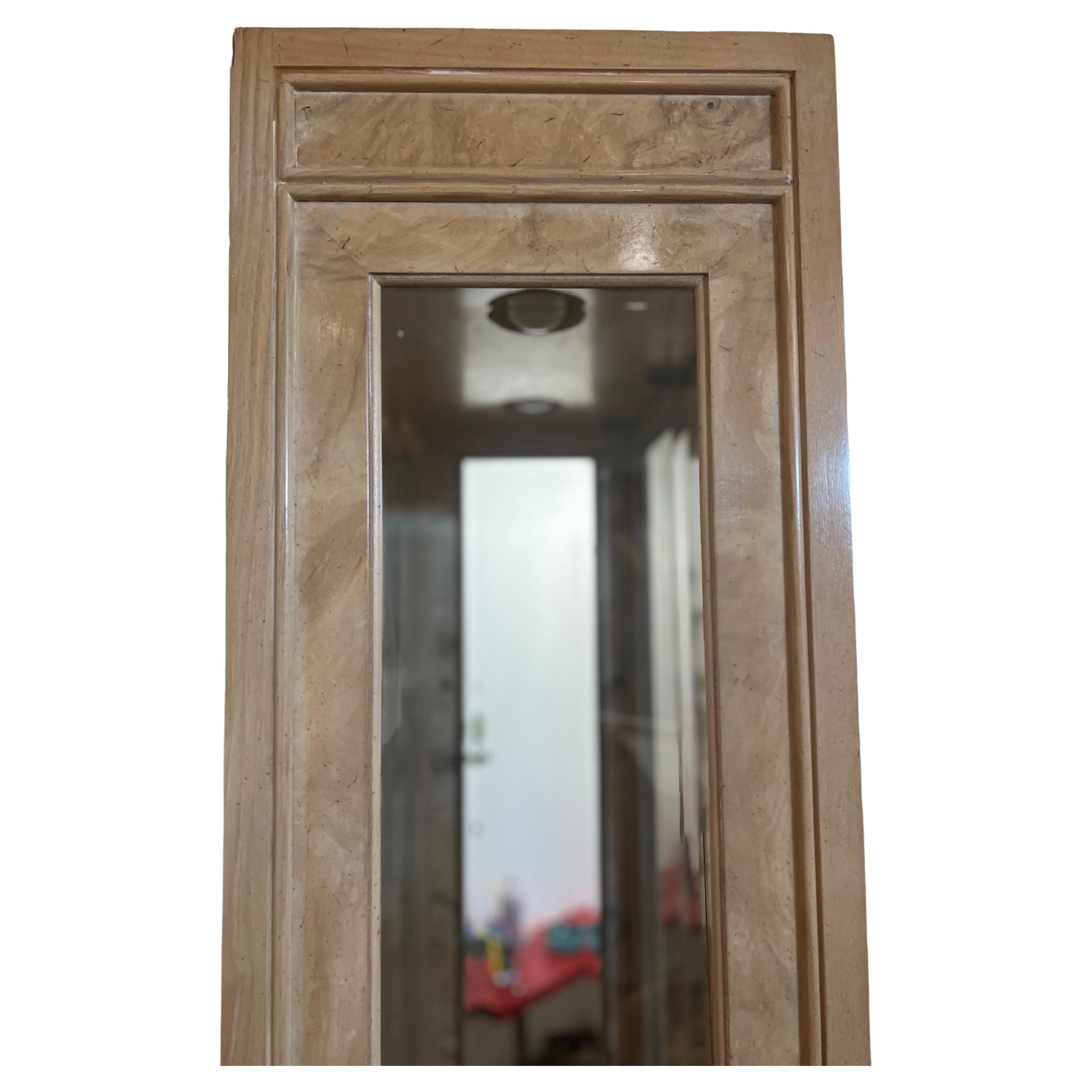 Beautiful elegant double door mirrored glass cabinet, lighted interior with black lacquer flat base comes with 3 thick glass shelves, its in great condition very elegant with brass handles in very nice condition.