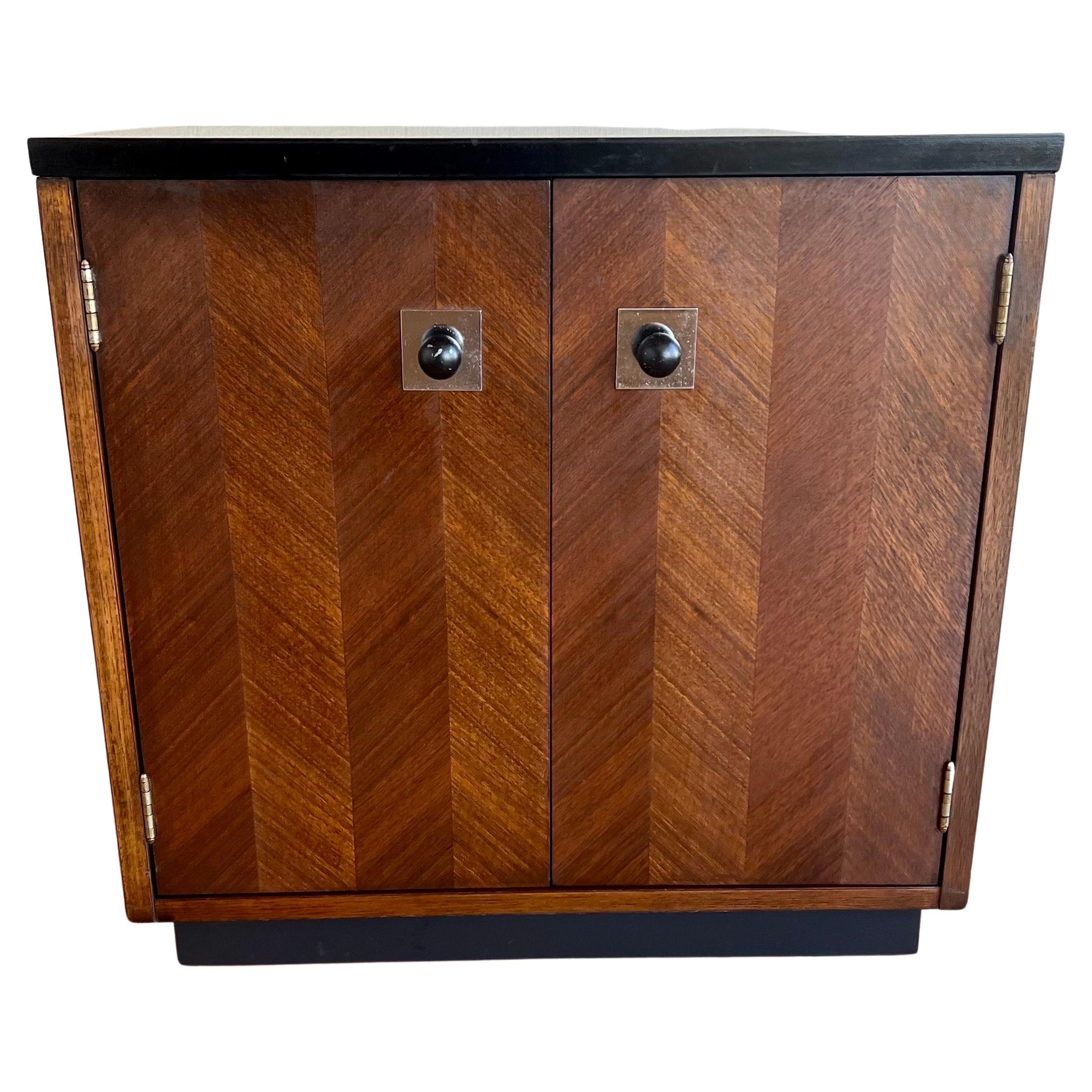 Beautiful pair of nightstands by Thomasville. in walnut with black laminated tops gorgeous chrome polished handles and nice black lacquer flat bases, very clean original finish, and condition drawer insert we have cleaned oiled, and polished the