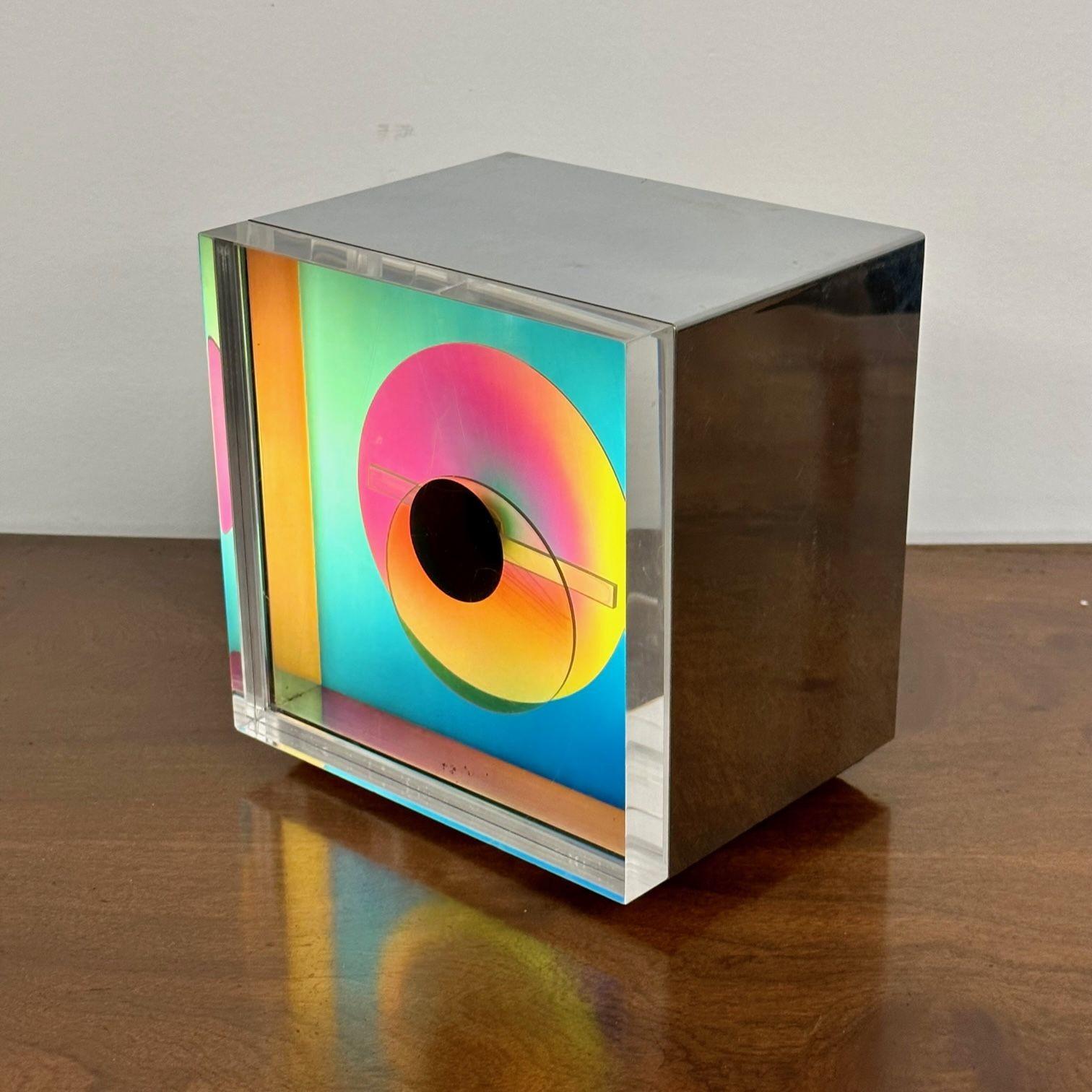 American Mid-Century Modern Prisma aluminum aurora clock, Kirsch Hamilton, 1970s.
 
A vintage 1970s Aurora clock. These stunning clocks are in the collection of the Museum of Modern Art MOMA in NY. Developed in the 1970s by a NASA engineer and an