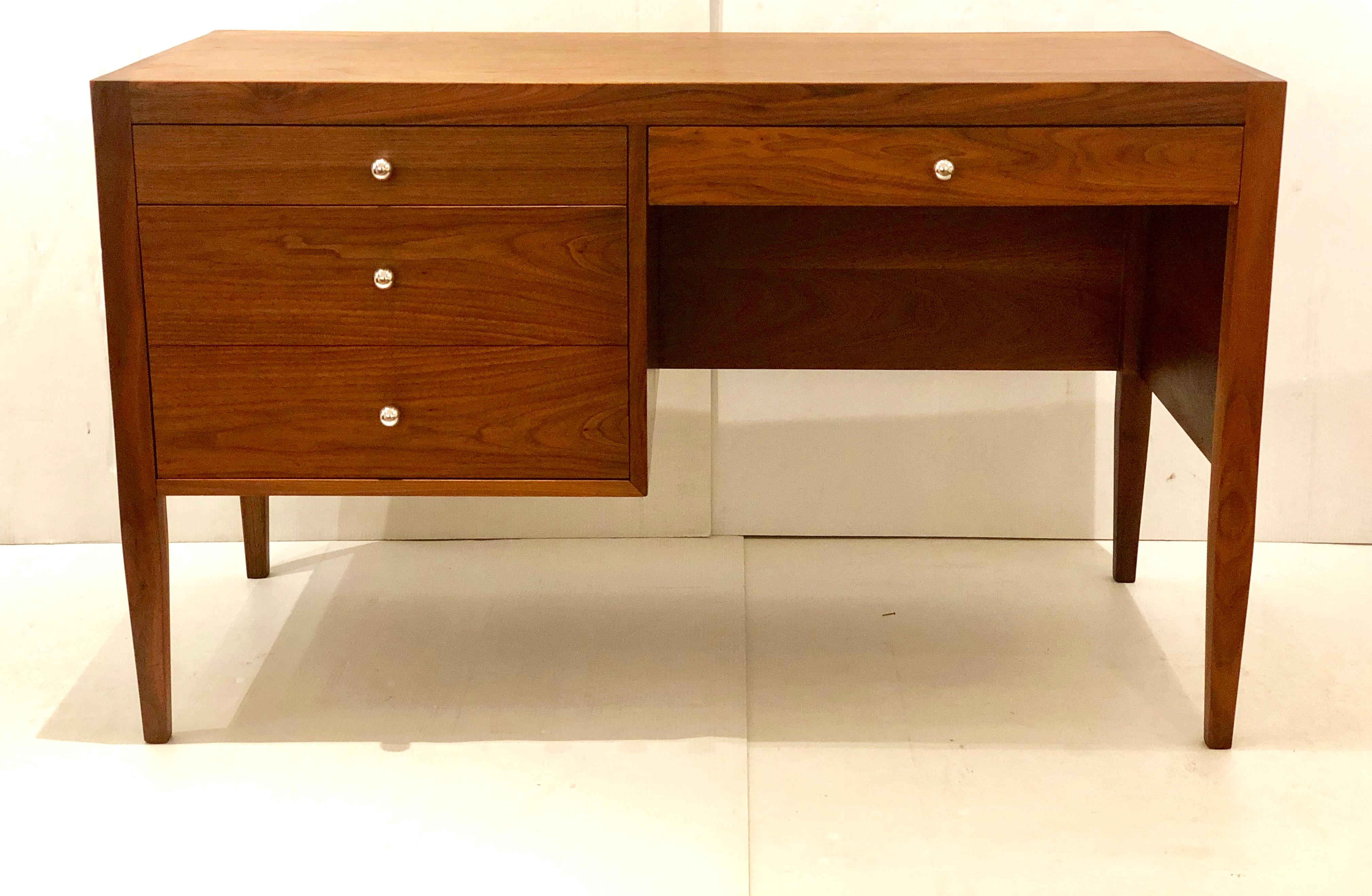 Beautiful well done walnut desk, incredible craftsmanship finished in the back with nice top corner joint details, circa 1960s , freshly refinished with file drawer. Freshly refinished and hand rubbed oil. Nice clean and sturdy.