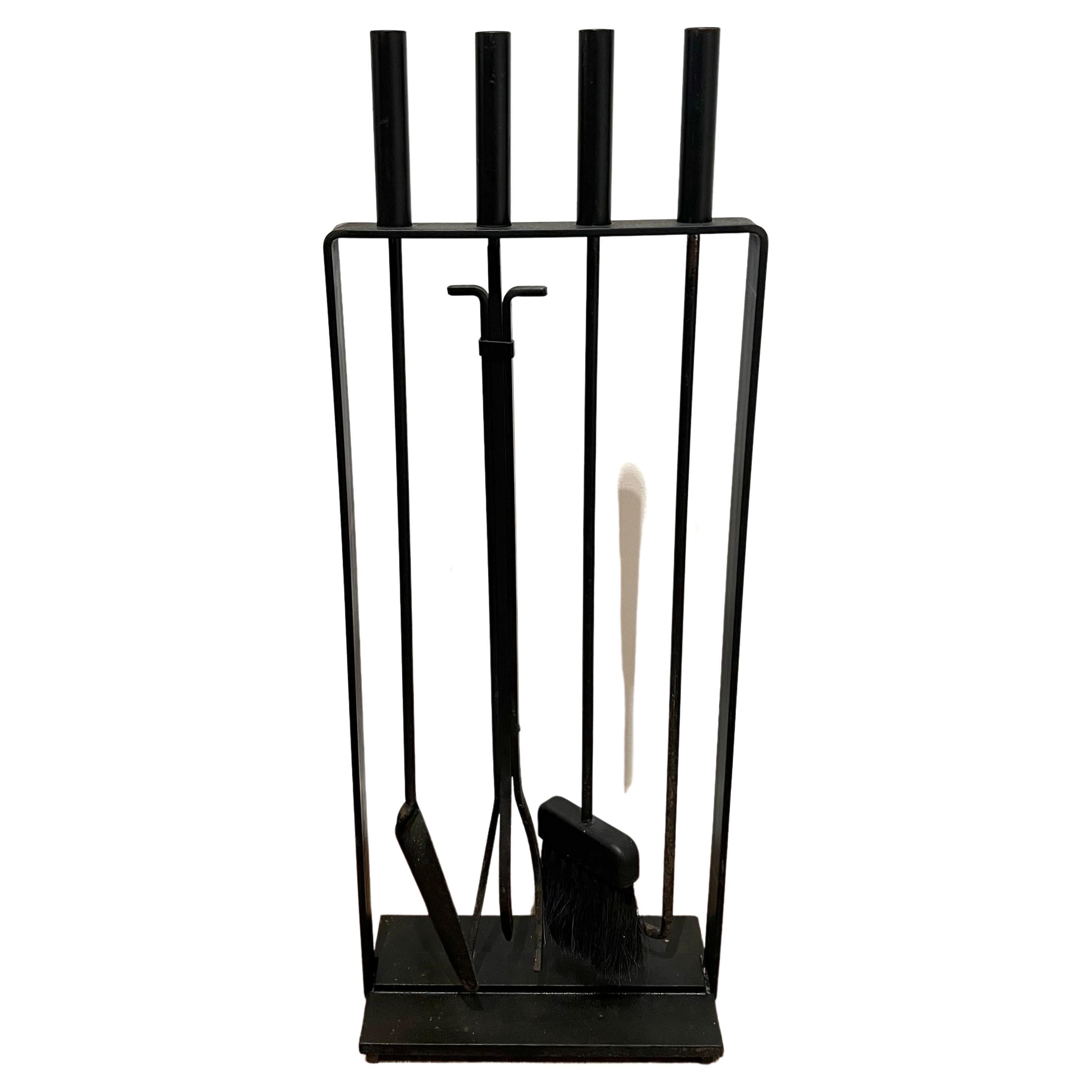 Solid iron fire tools set in black enameled finish with a nice patina in original condition. can be used indoors or outdoors.
