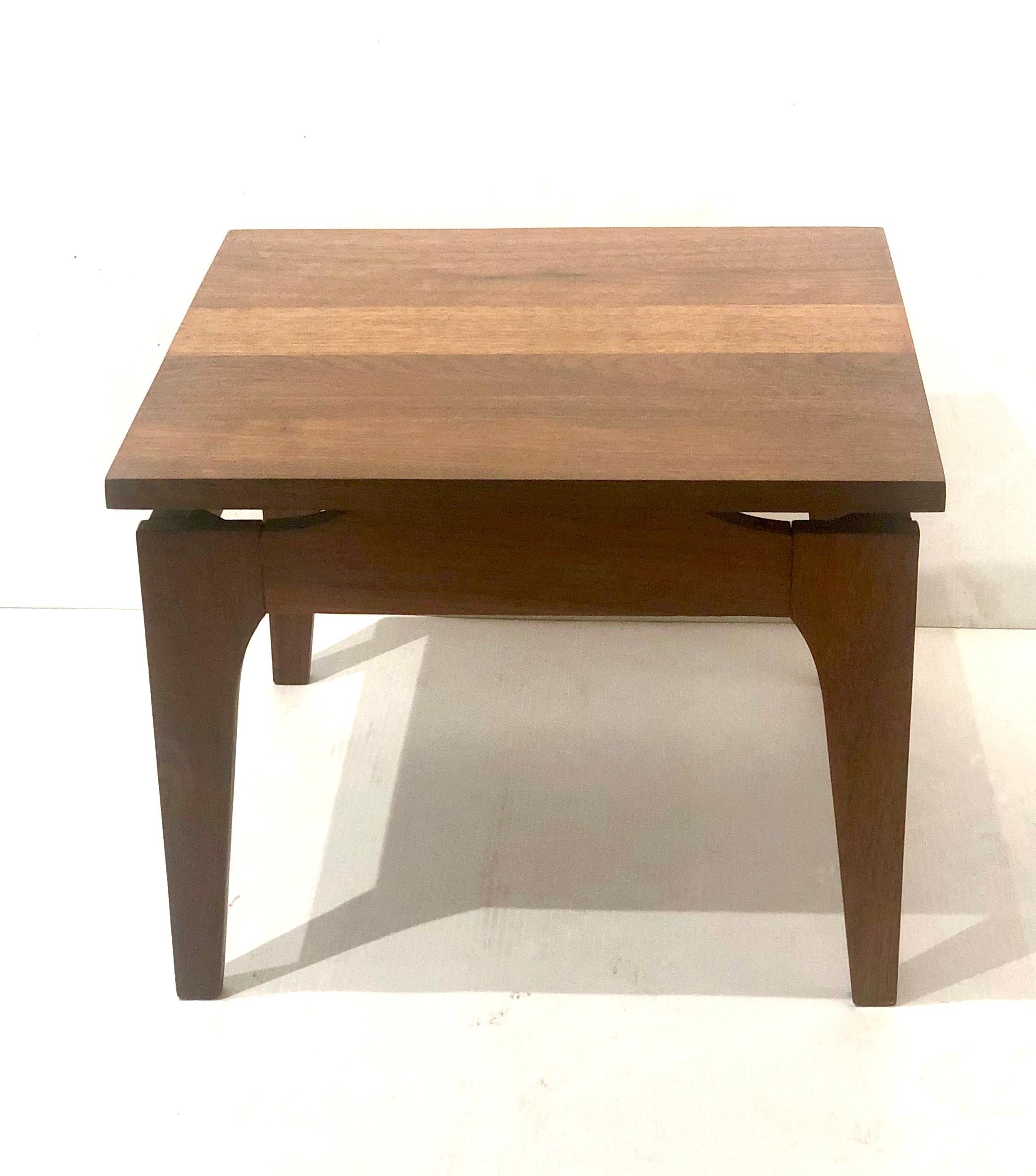 Simple elegant solid midcentury end cocktail table, in the style of Jens Risom, circa 1950s solid and sturdy freshly refinished this table can be used between 2 chairs or next to a sofa, great craftsmanship and quality . With a floating top.