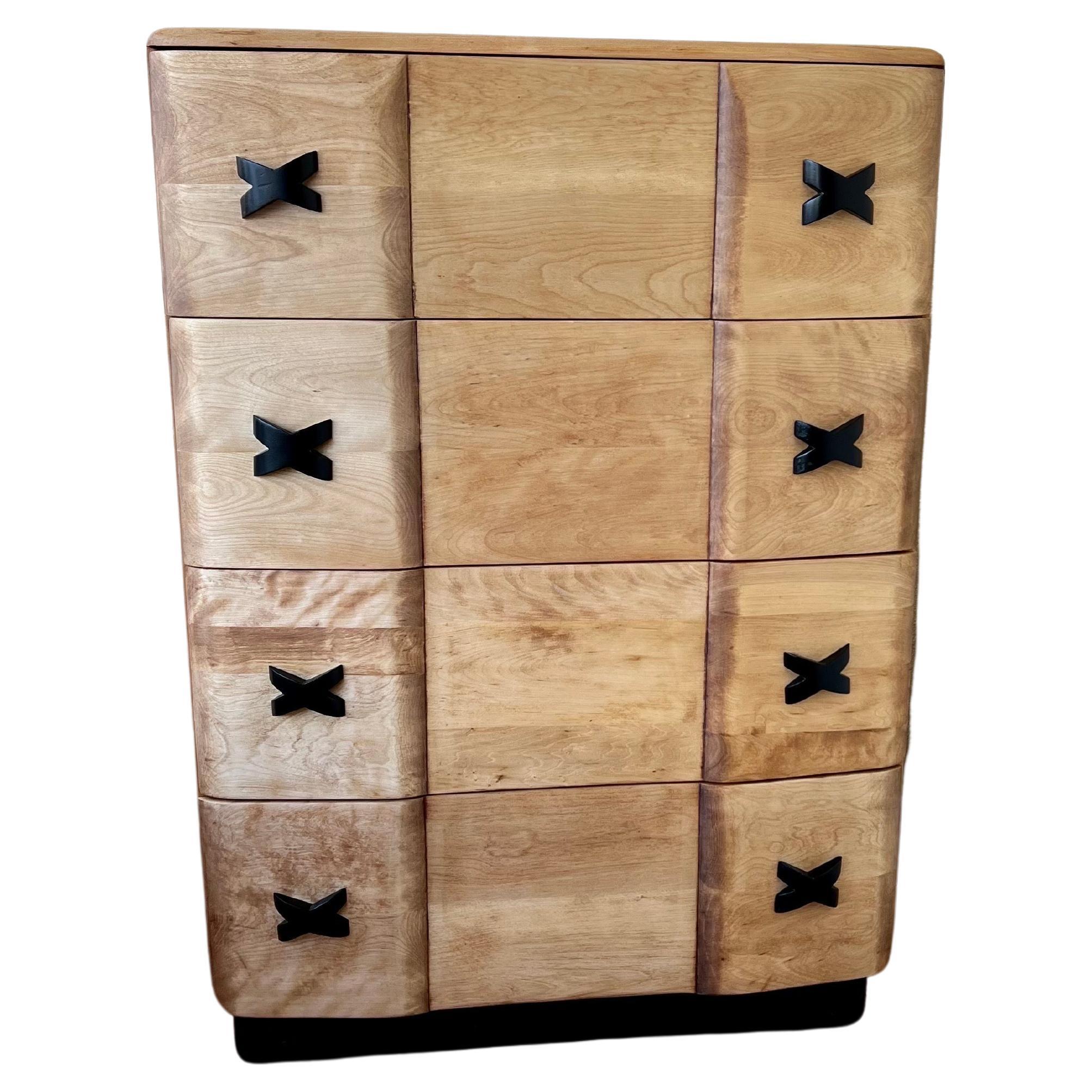 Fantastic tall boy chest of drawers by Heywood Wakefield, solid maple wood freshly refinished with black lacquer handles and base solid piece great looking.