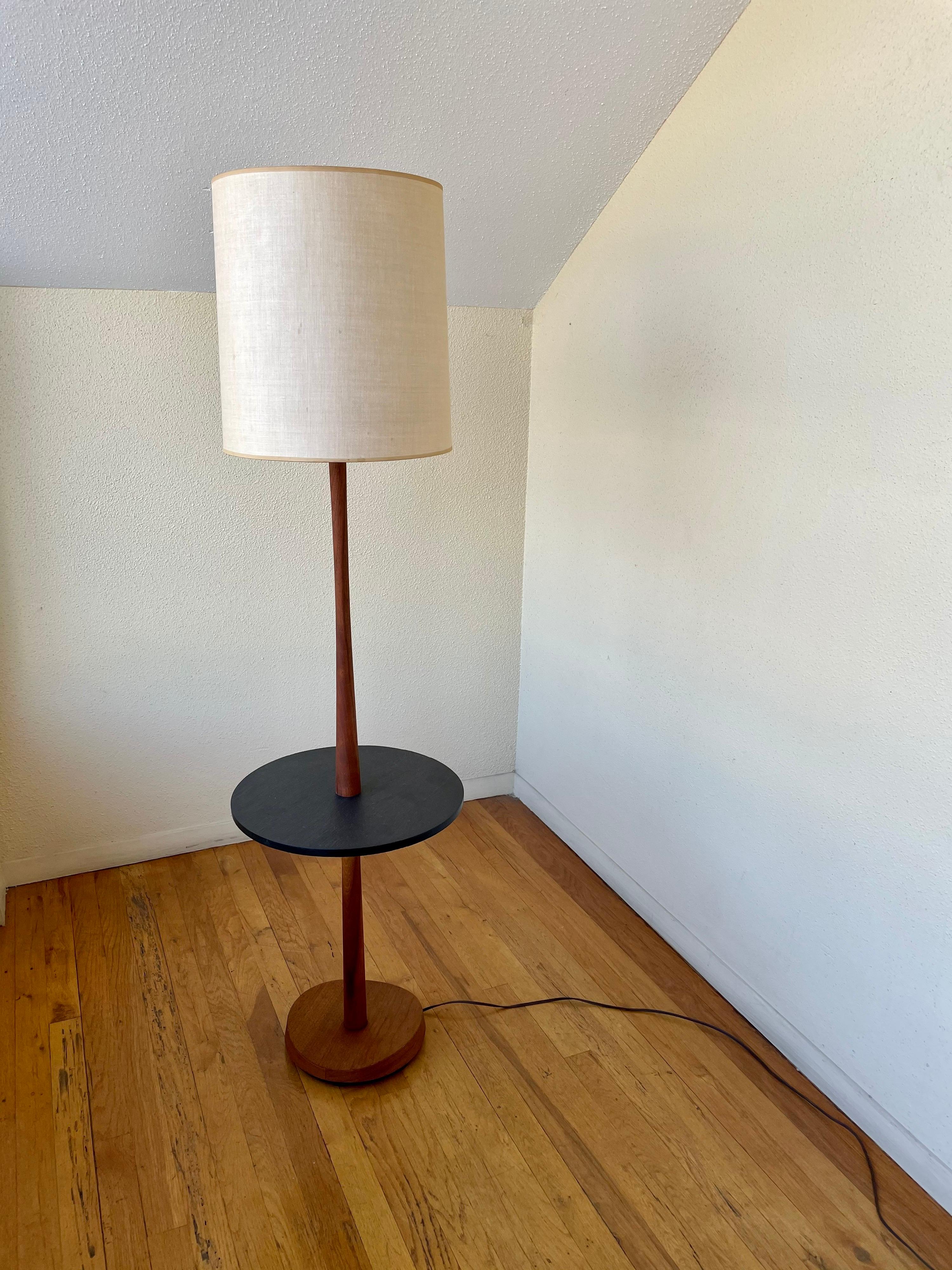 Beautiful and rare floor table lamp in teak with slate table floor lamp circa 1960's , all original we took it apart cleaned and oiled the lampshade its original, its in perfect working condition.