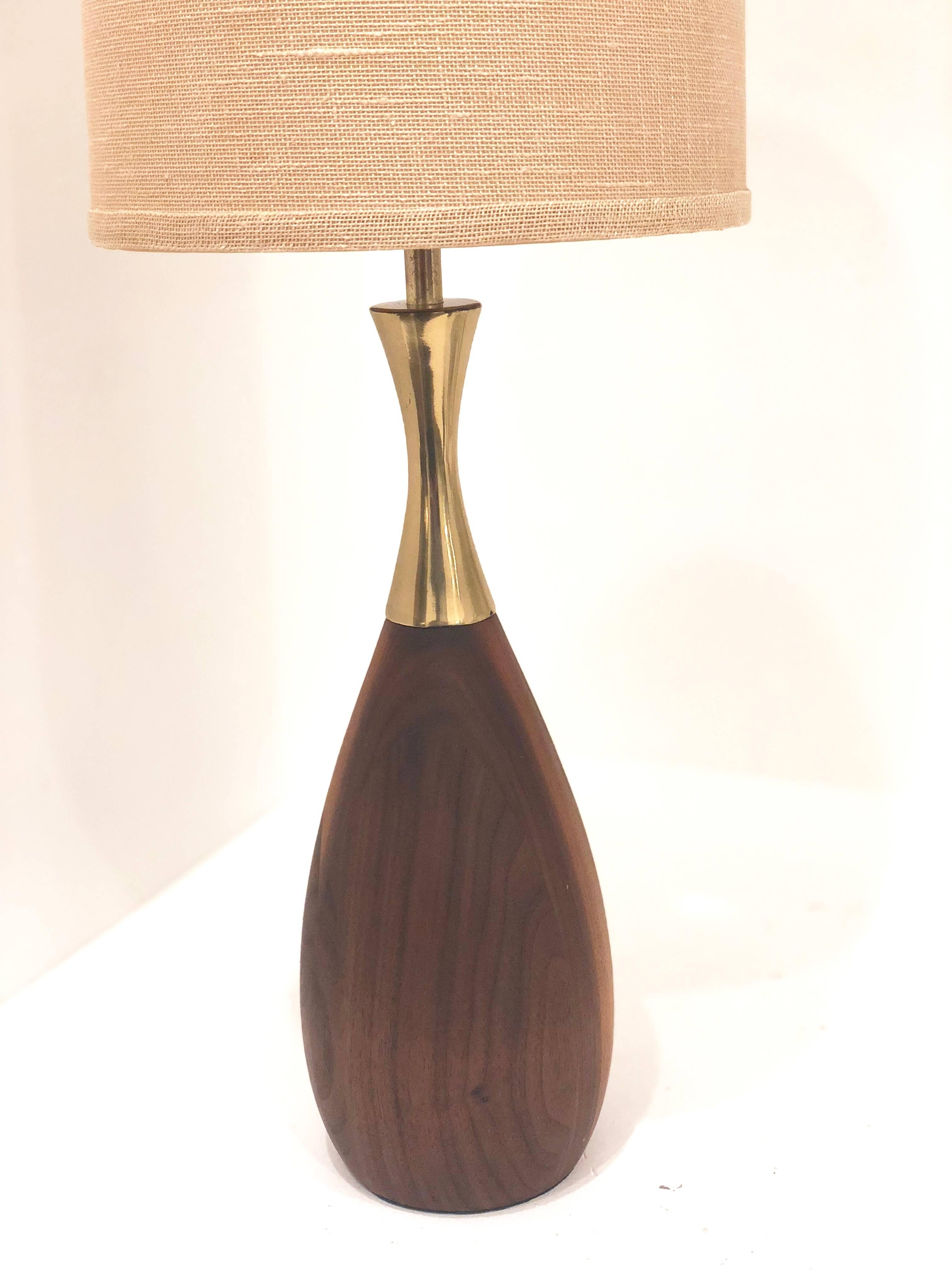 Beautiful solid walnut base with polished and rewired. Nice original lampshade in good original condition, natural wear and tear due to age, and the base has been refinished and the brass polished. The lampshade its 8