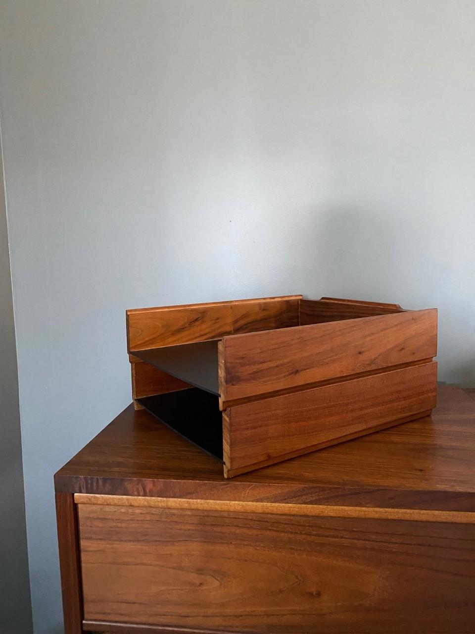 Handsome and chic double letter desk tray with solid walnut walls, circa 1970s. Beautiful accent to any executives desk or complement to your décor. Classic California design. This piece by R.W. Shield Industries projects style and legacy in the