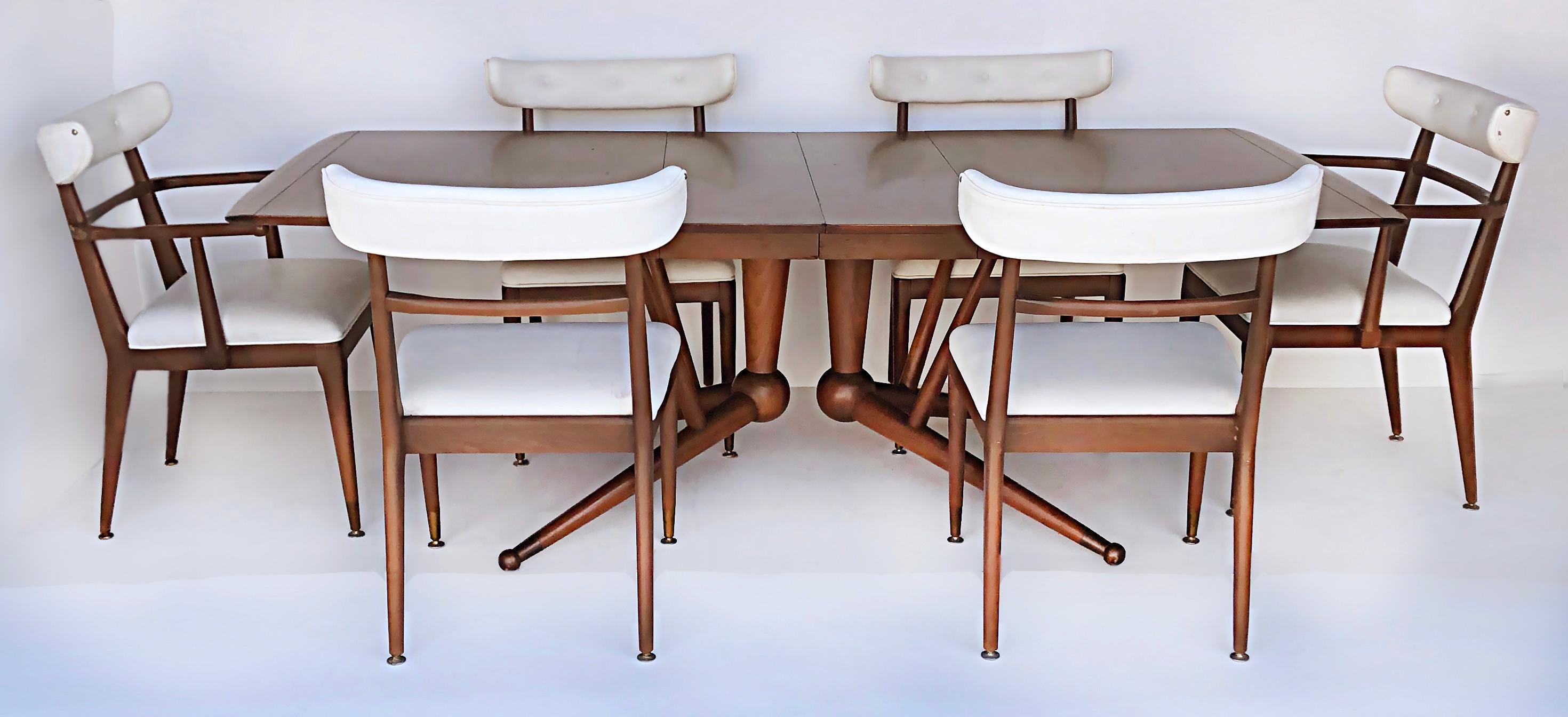 American Mid-Century Modernist dining chairs, set of 6.

Offered for sale is a set of six American mid-century modernist dining chairs including two armchairs and four side chairs. The chairs are upholstered in vintage white Naugahyde and have