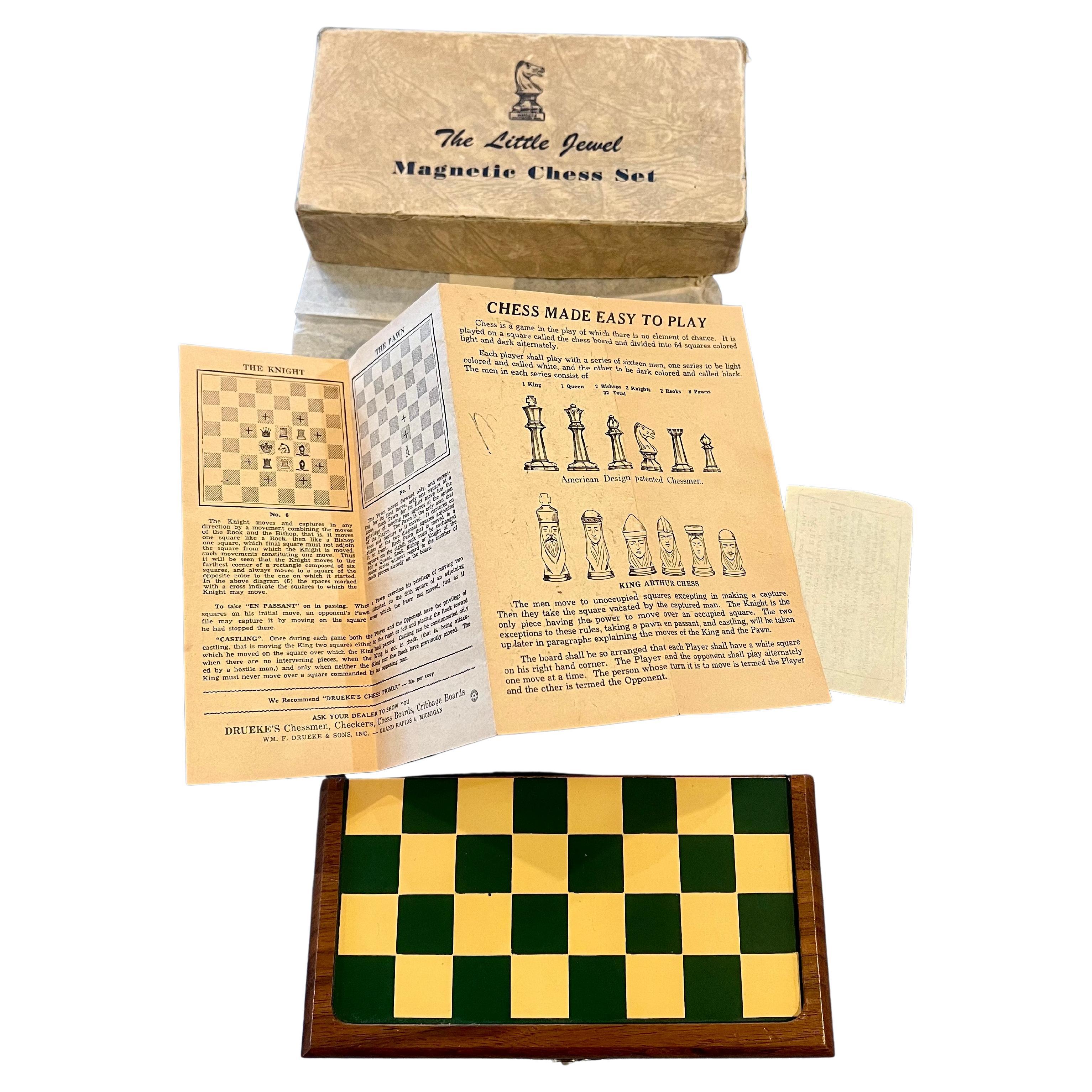 A unique rare 1950's portable magnetic chess set walnut caze with metal board , very nice condition original box and instructions .