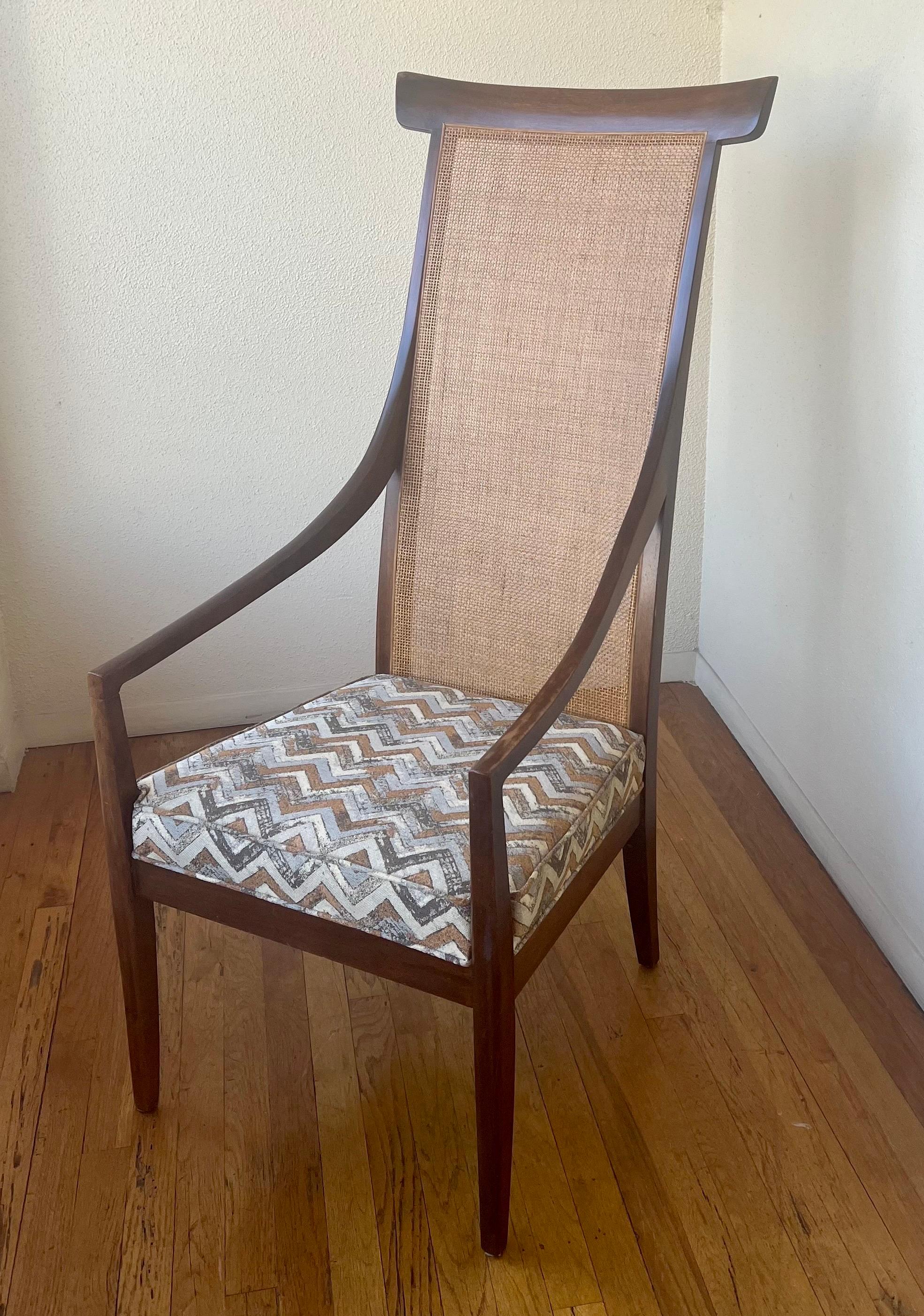 Incredible rare solid walnut frame with cane back, American mid-century upholstered chair beautiful original condition nice chevron upholstered seat.