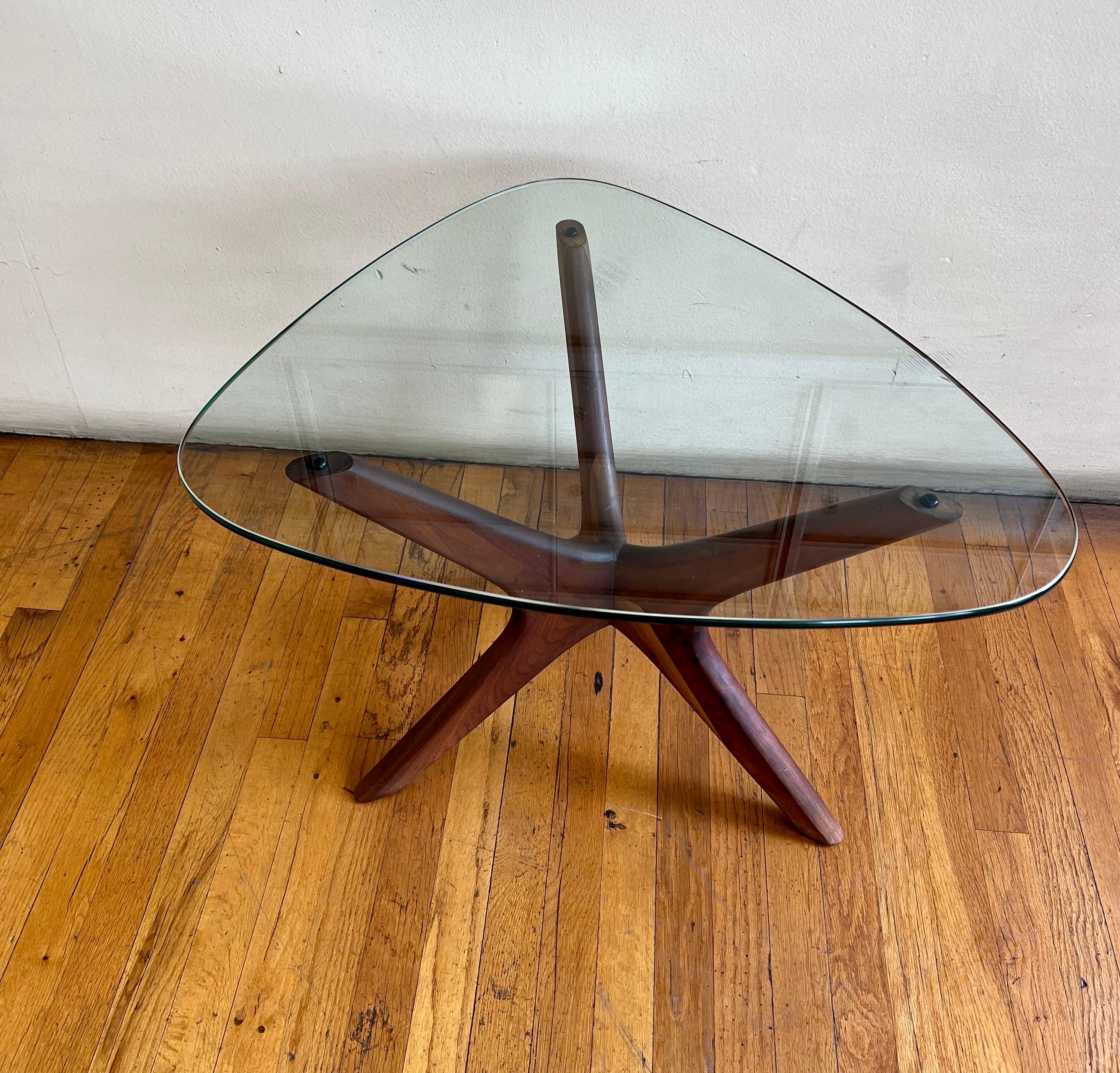 Beautifully sculpted walnut wood base with freeform glass top, circa 1960's great condition solid sturdy, and good looking.