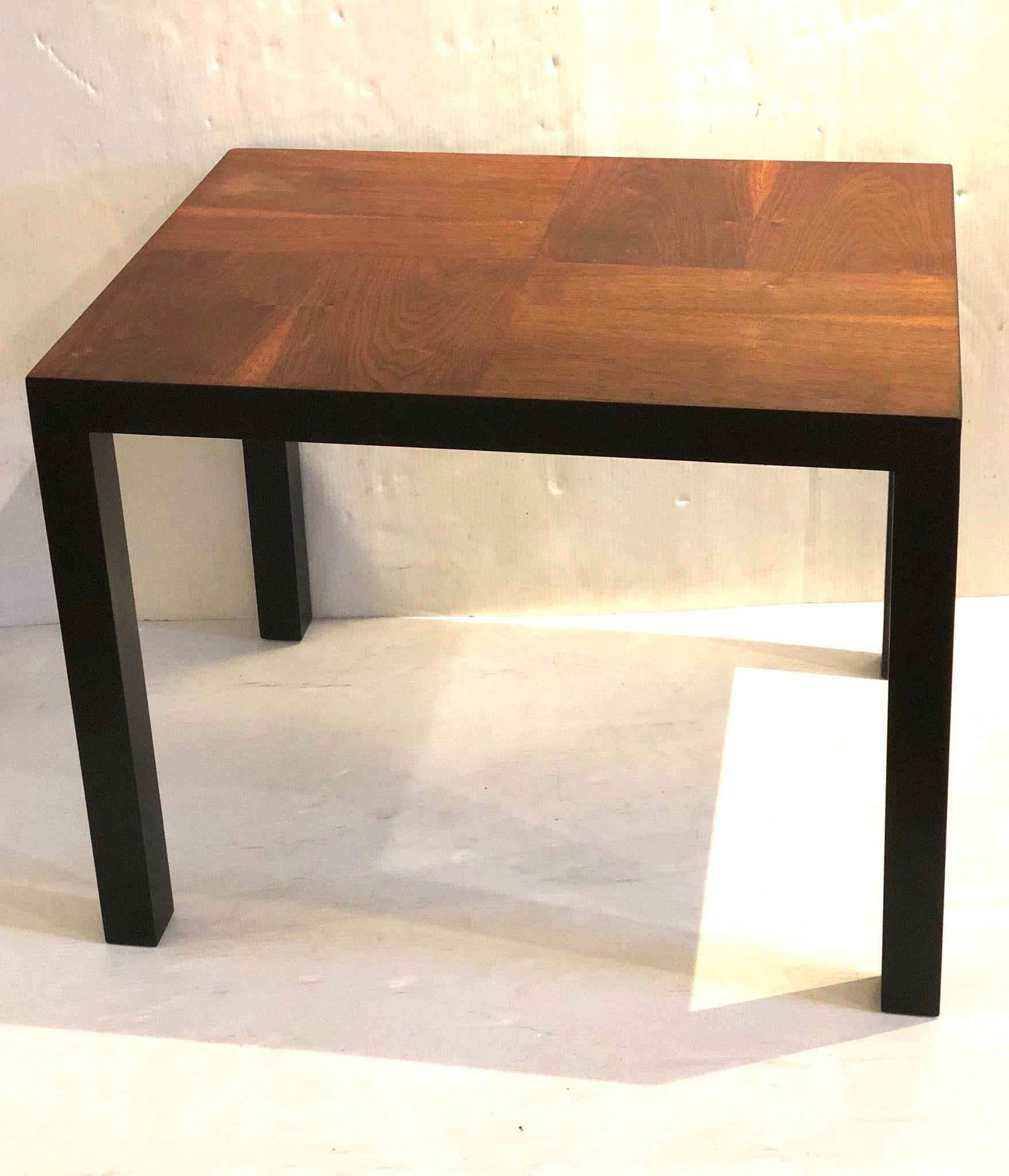 A beautiful unique Mid-Century Modern end cocktail table, freshly refinished the top has a checker board design, the edge and legs have been refinished in black lacquer. simple elegant fits in many decors.