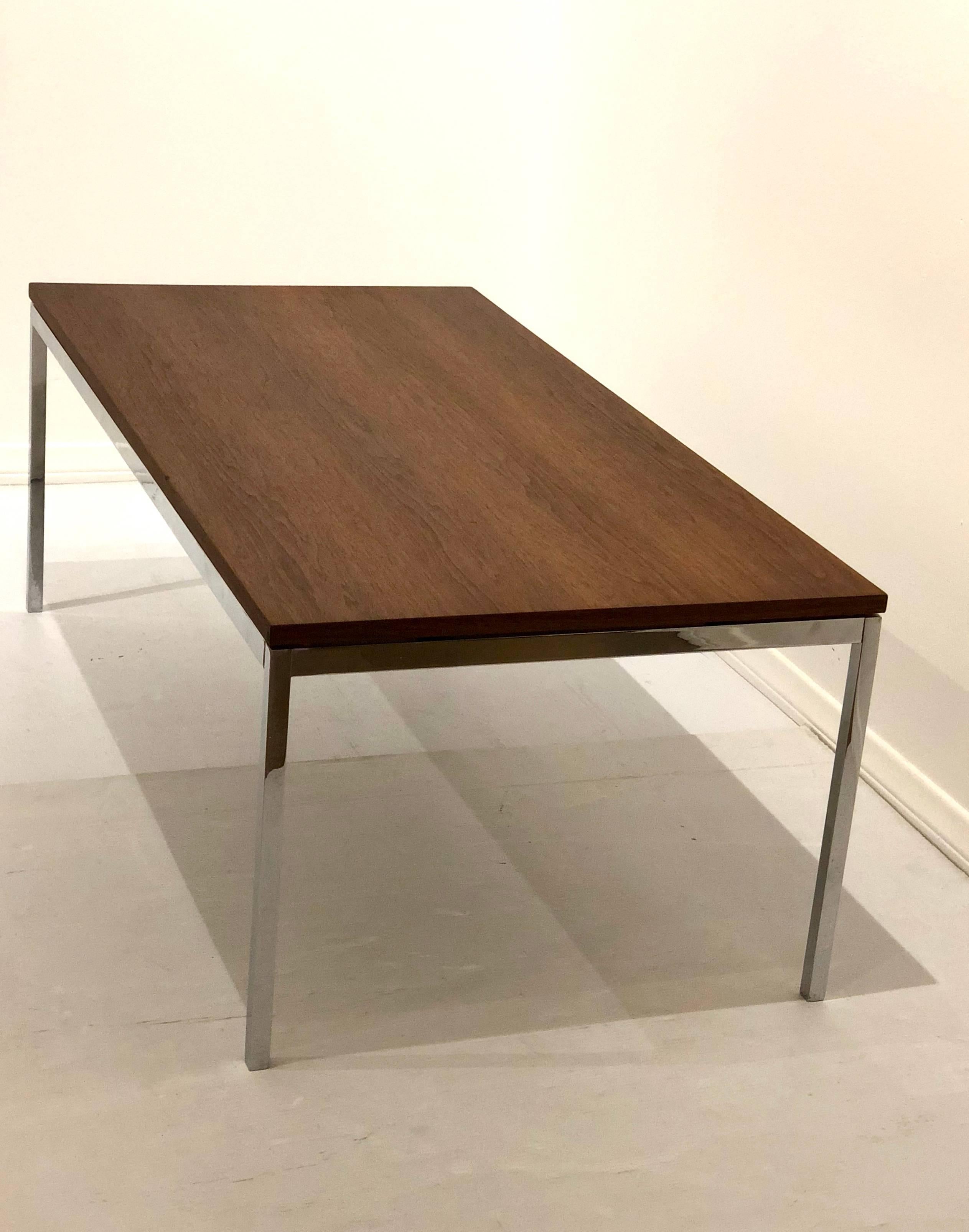 Simple elegant chrome-plated steel coffee table by Knoll, circa 1970s freshly refinished top and polished the base retains original early production label.