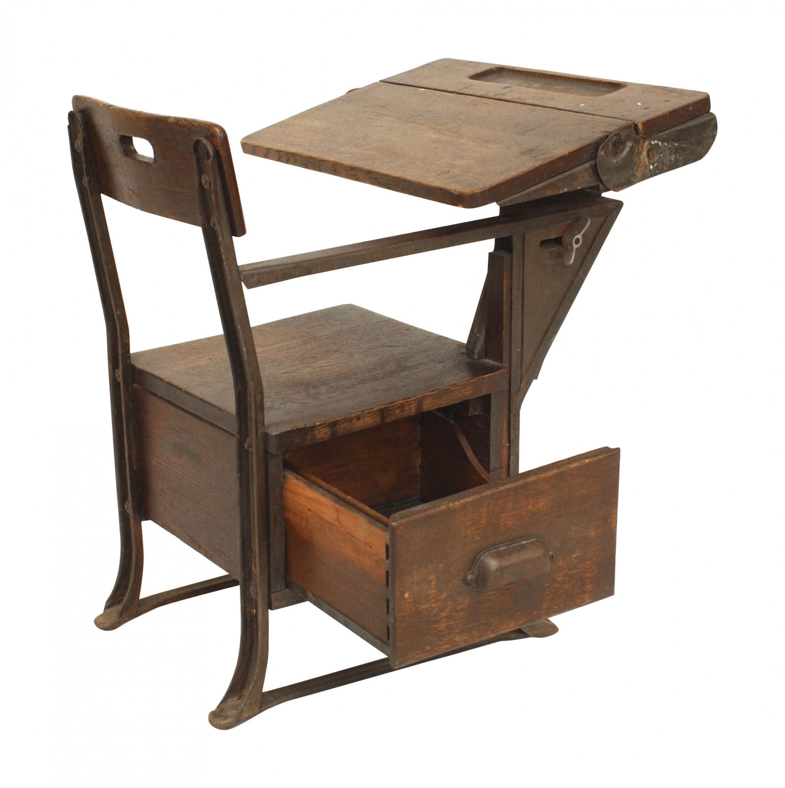 American Mission metal and oak small child's school desk with attached chair and flip top to desk.