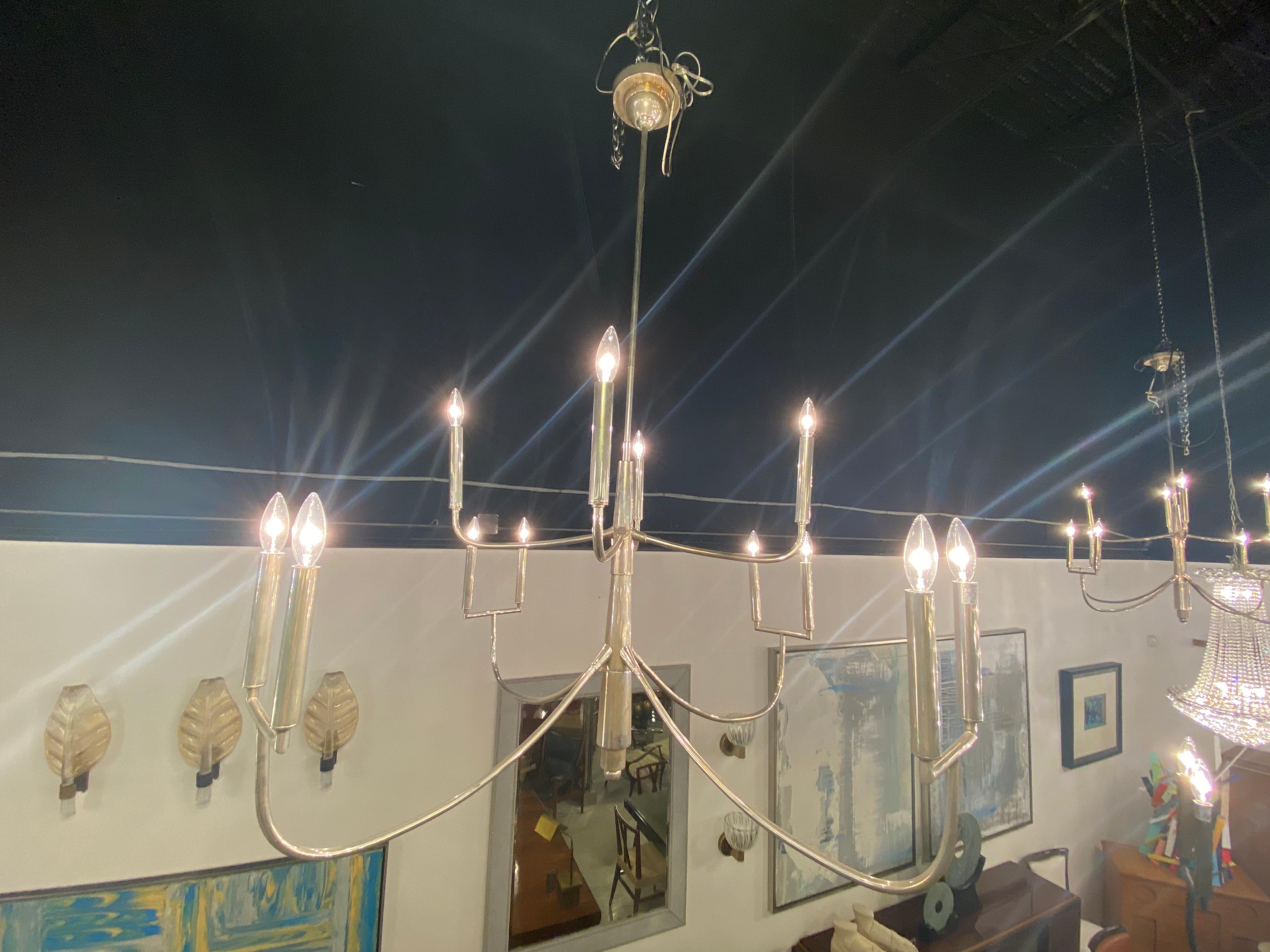 Late 20th Century American Modern 12 Light 8 Arm Polished Silver Chandelier For Sale