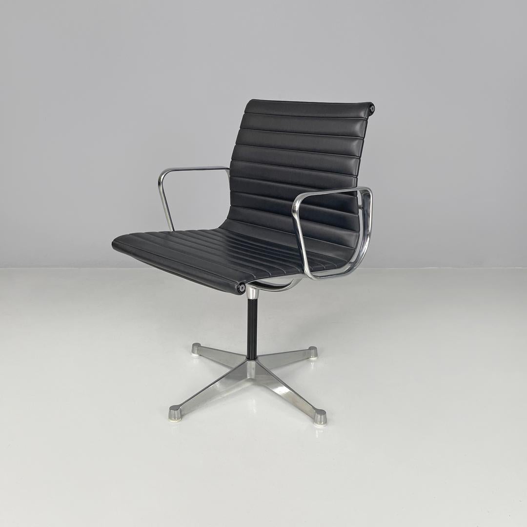 American modern office chair EA108 Charles and Ray Eames for Herman Miller 1970s
Office chair mod. EA108 with armrests. The seat and back are covered in black leather with horizontal stitching. The structure is in chromed metal, with an arched shape